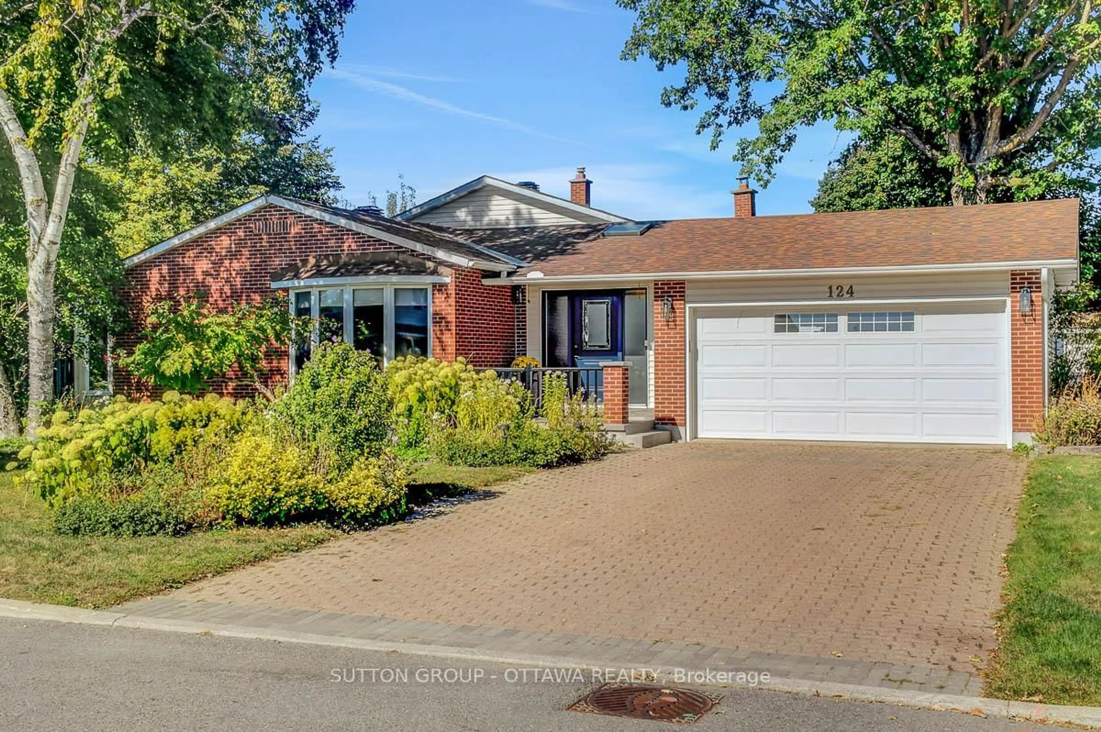 Home with brick exterior material, street for 124 Post Rd, Ottawa Ontario K2L 1L2