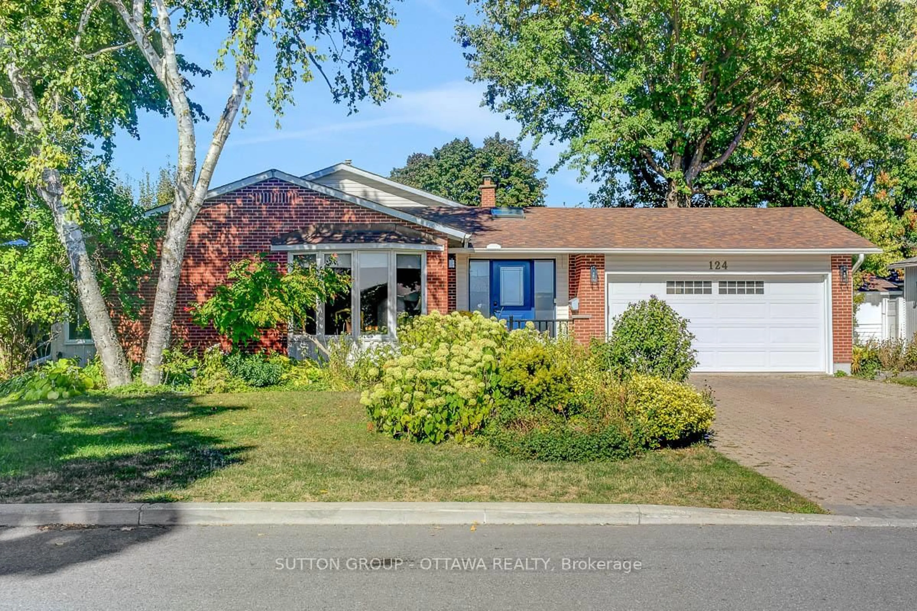 Home with brick exterior material, street for 124 Post Rd, Ottawa Ontario K2L 1L2