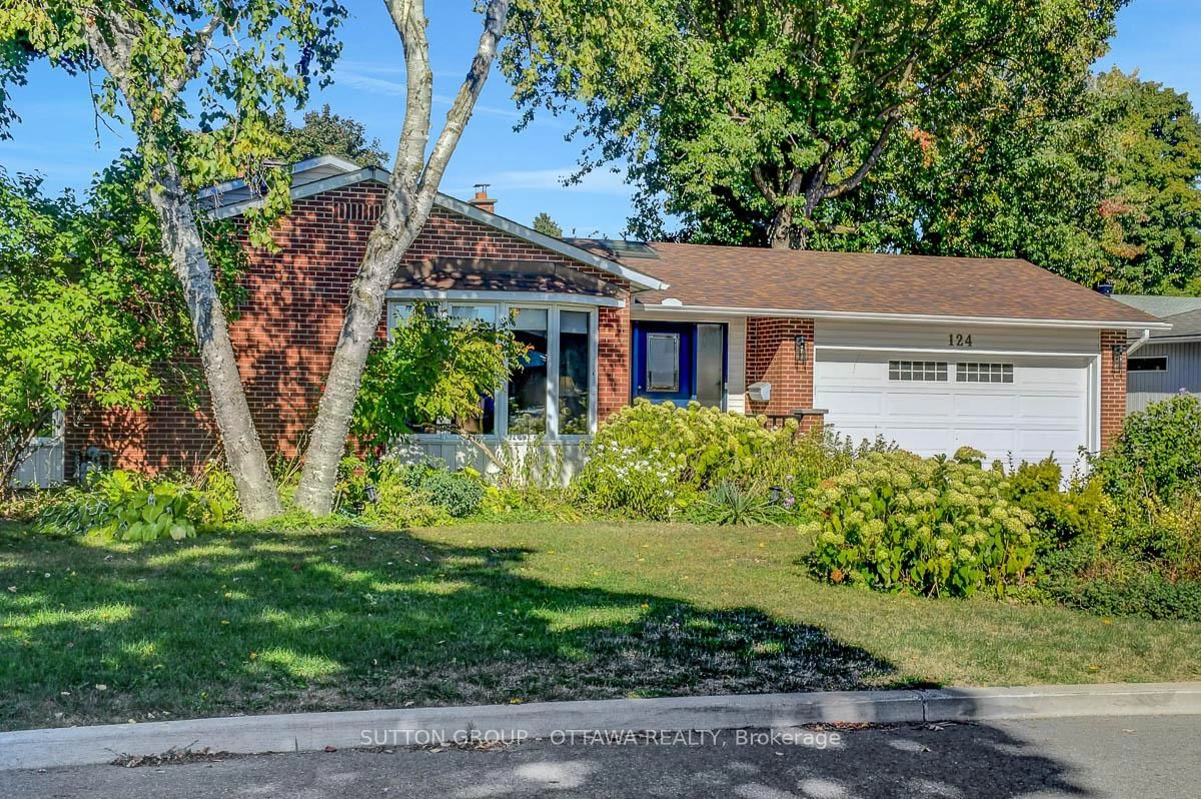 Home with brick exterior material, street for 124 Post Rd, Ottawa Ontario K2L 1L2