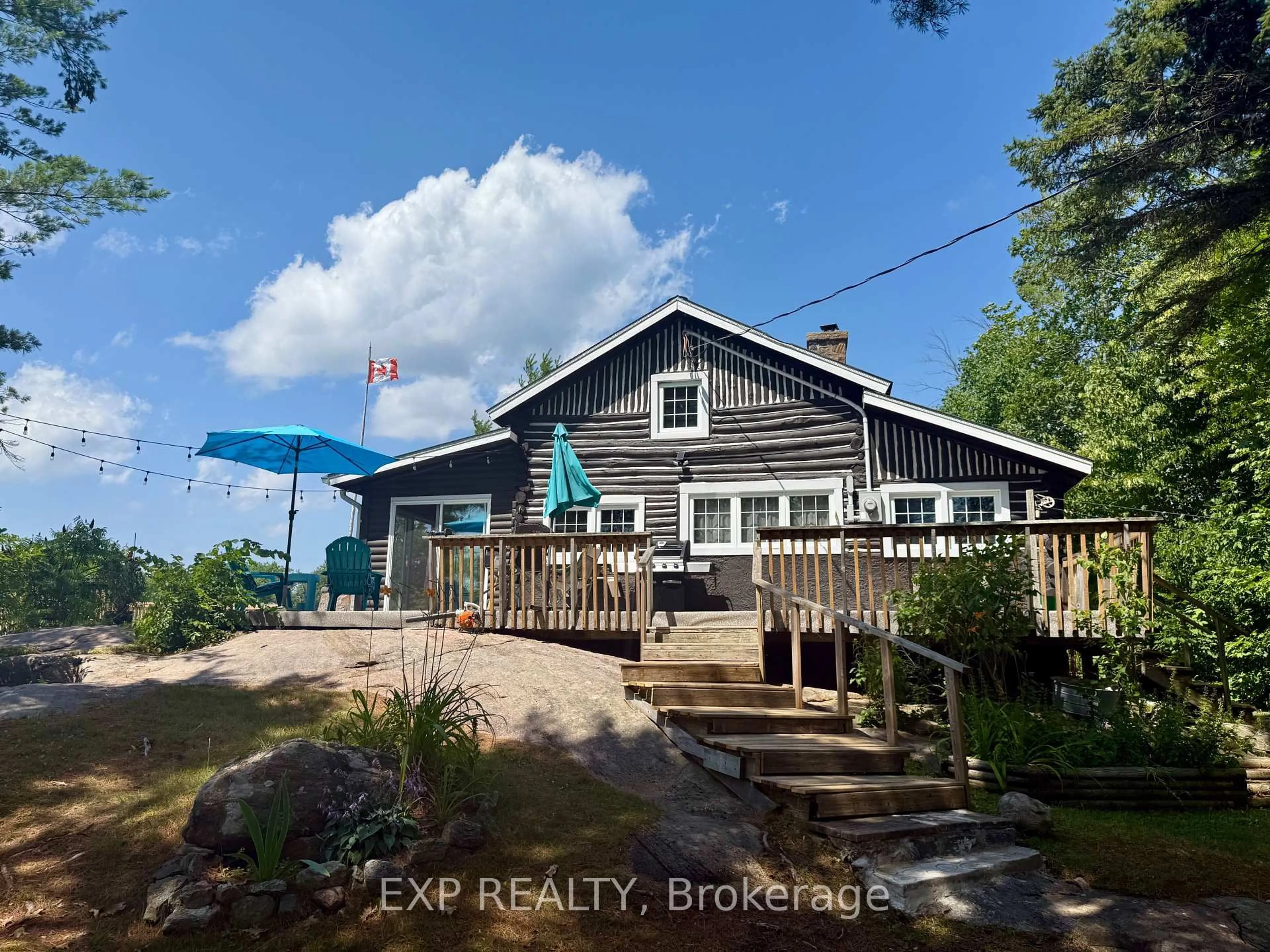 A pic from outside/outdoor area/front of a property/back of a property/a pic from drone, water/lake/river/ocean view for 2 Island 860, Georgian Bay Ontario L0K 1S0