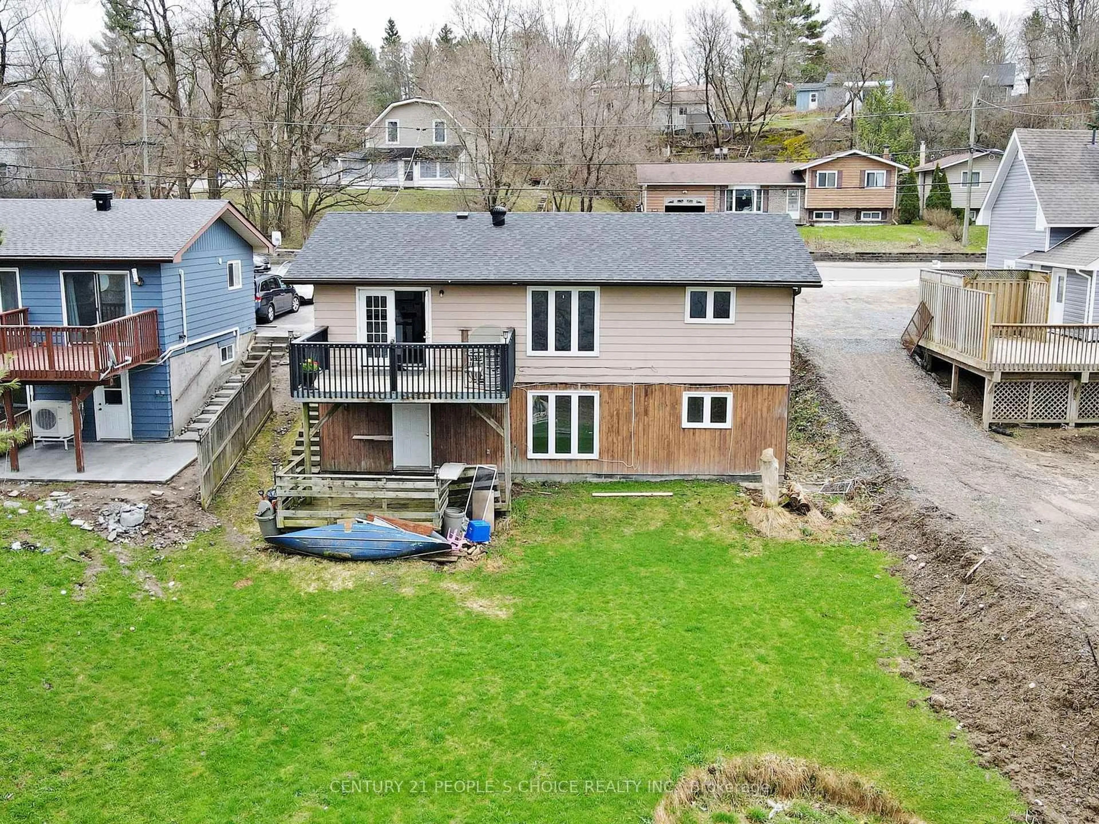 A pic from outside/outdoor area/front of a property/back of a property/a pic from drone, water/lake/river/ocean view for 156 Main St, Huntsville Ontario P1H 1X8