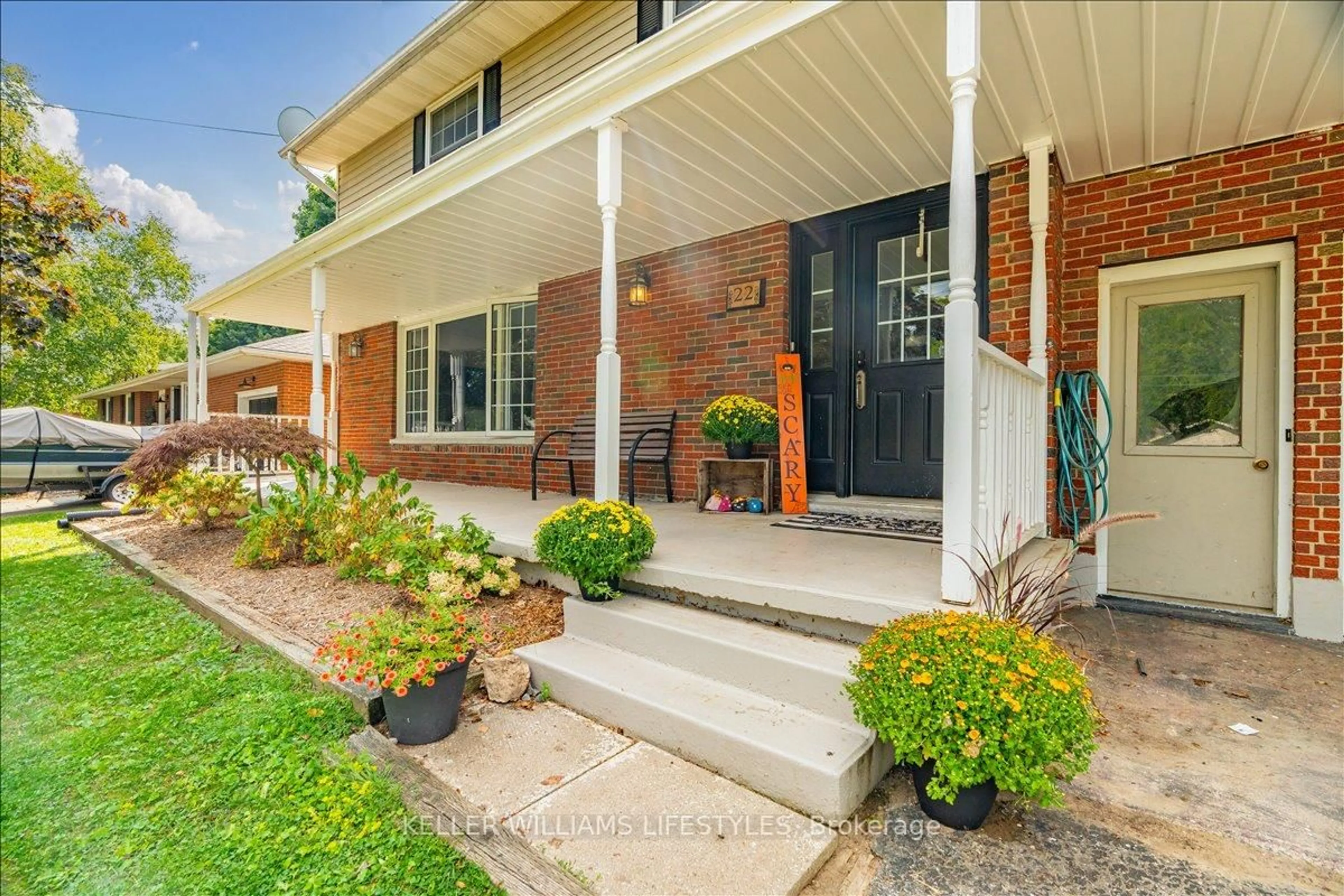 Home with brick exterior material, street for 22 Park Lane, Lambton Shores Ontario N0N 1J0