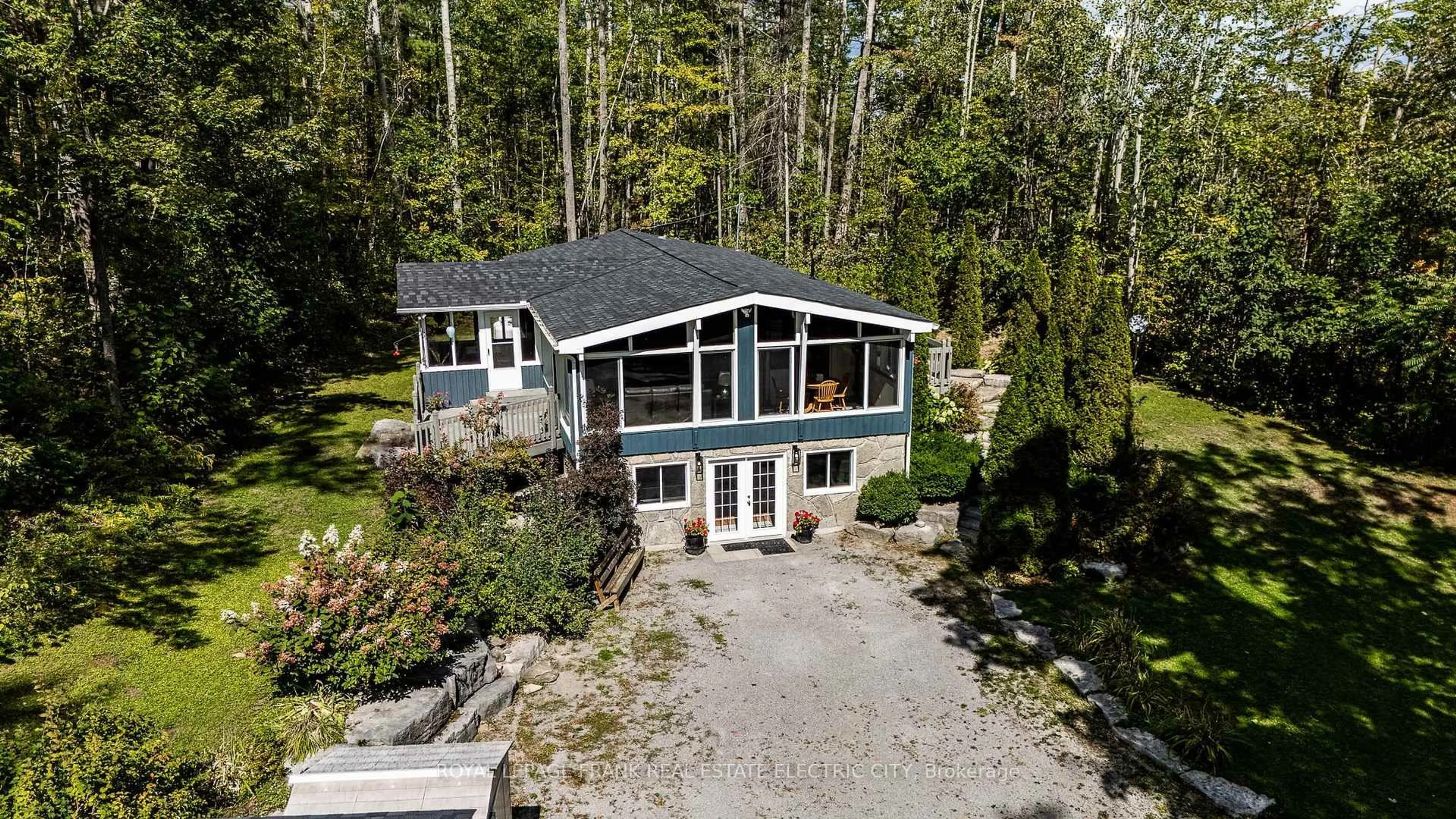 A pic from outside/outdoor area/front of a property/back of a property/a pic from drone, unknown for 2886 County Road 36 Rd, Trent Lakes Ontario K0L 1J0