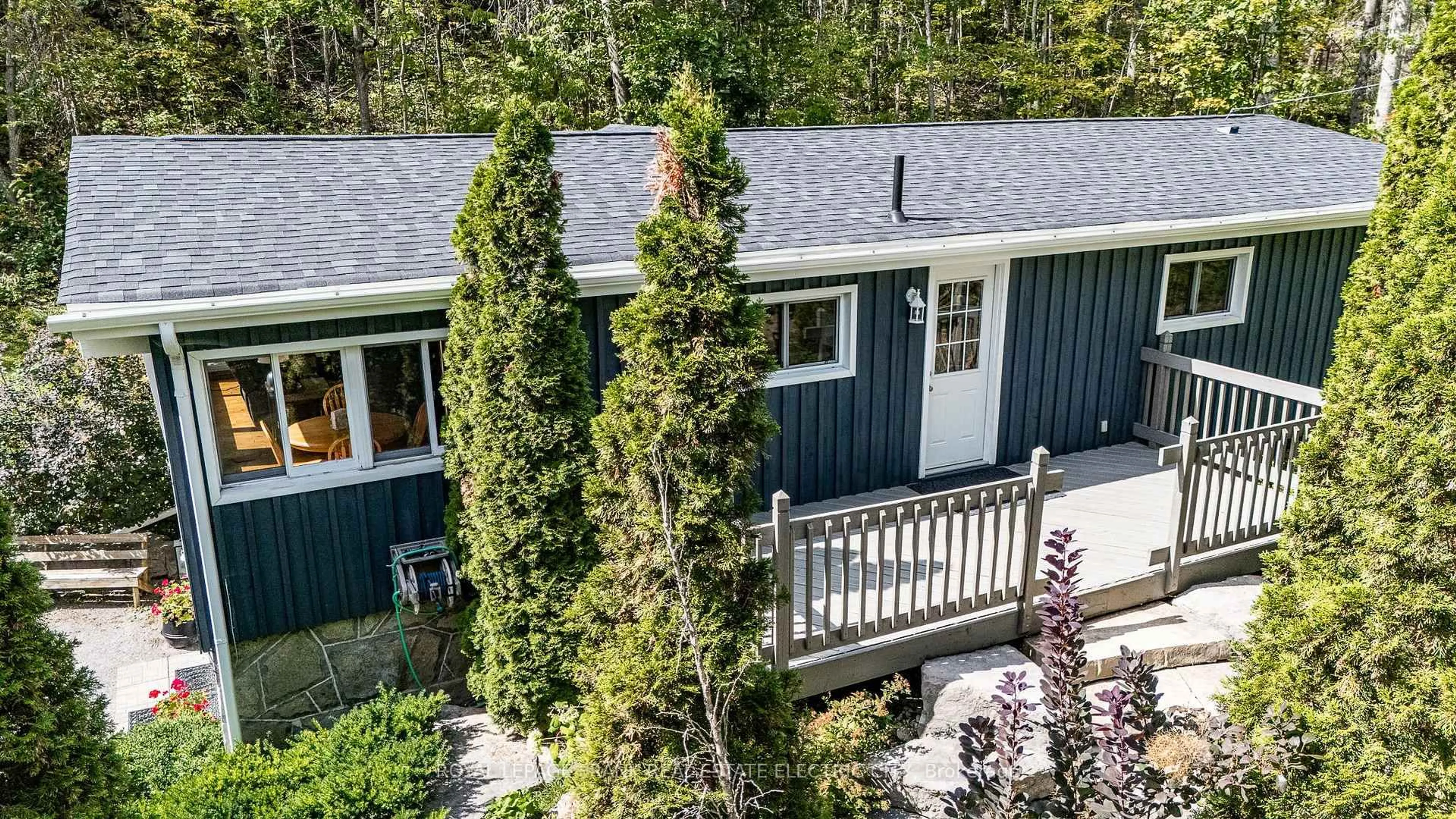 A pic from outside/outdoor area/front of a property/back of a property/a pic from drone, unknown for 2886 County Road 36 Rd, Trent Lakes Ontario K0L 1J0