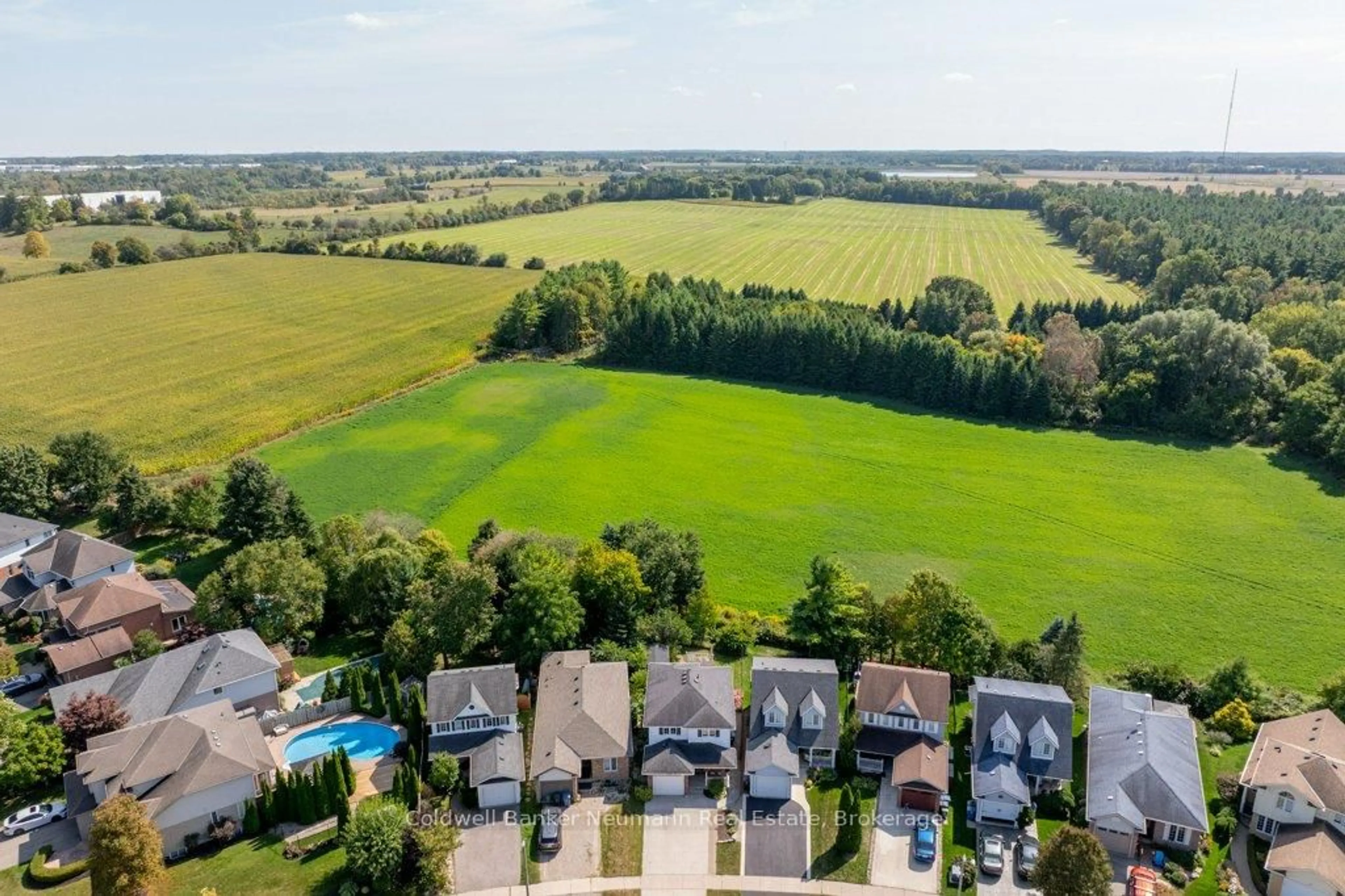 A pic from outside/outdoor area/front of a property/back of a property/a pic from drone, water/lake/river/ocean view for 71 Waxwing Cres, Guelph Ontario N1C 1E3