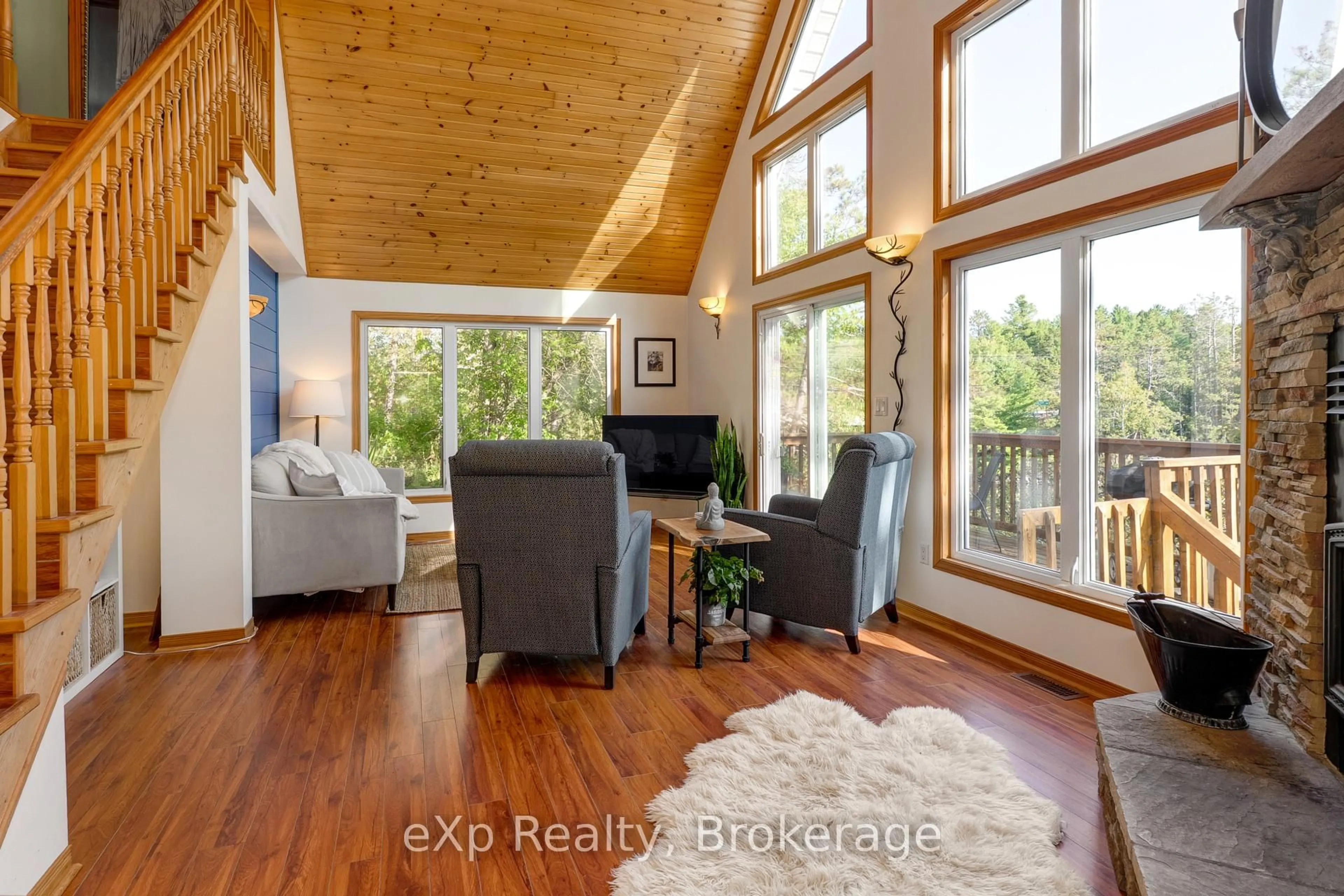 Living room with furniture, wood/laminate floor for 7953B 64 Highway, French River Ontario P0M 2K0