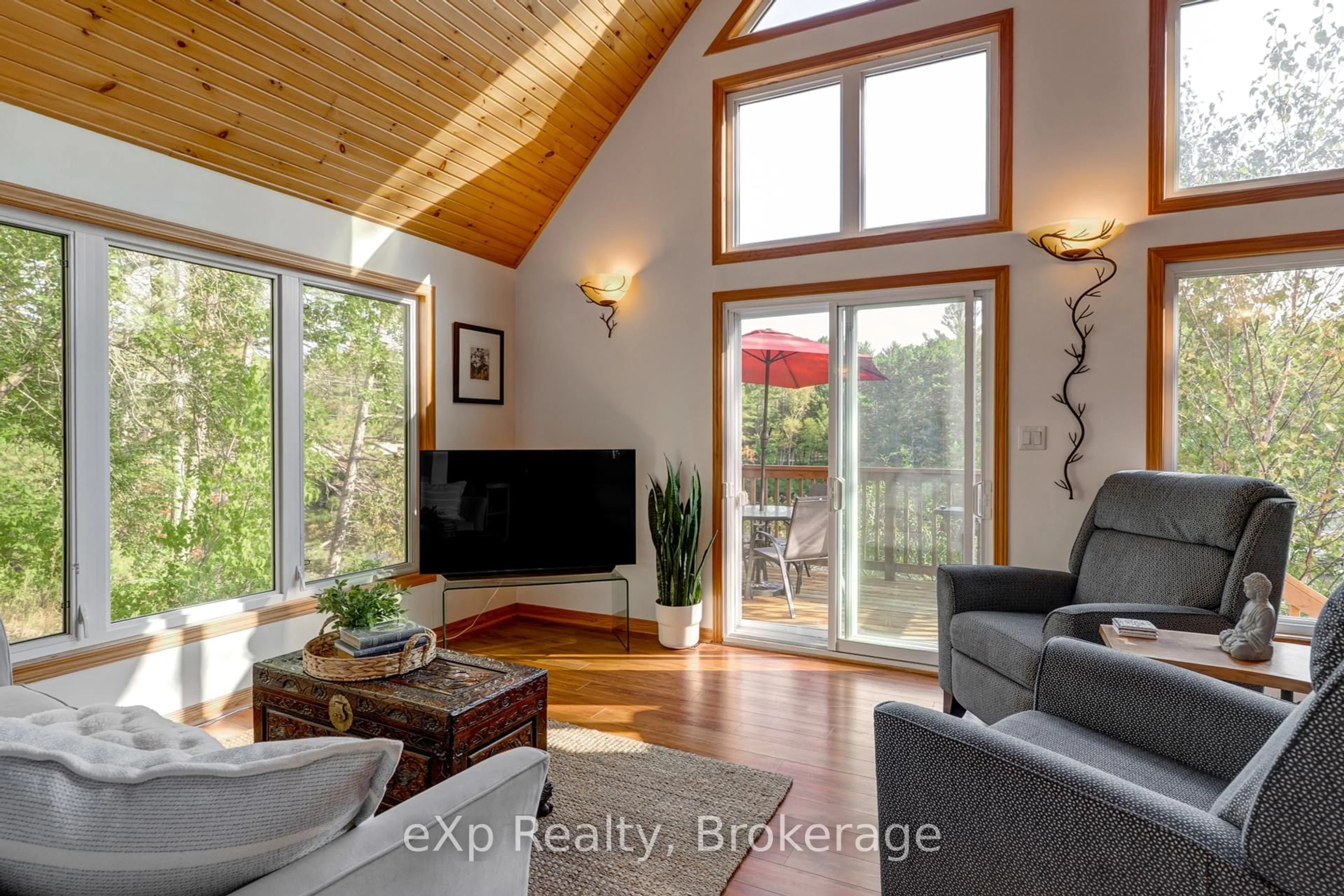 Living room with furniture, wood/laminate floor for 7953B 64 Highway, French River Ontario P0M 2K0