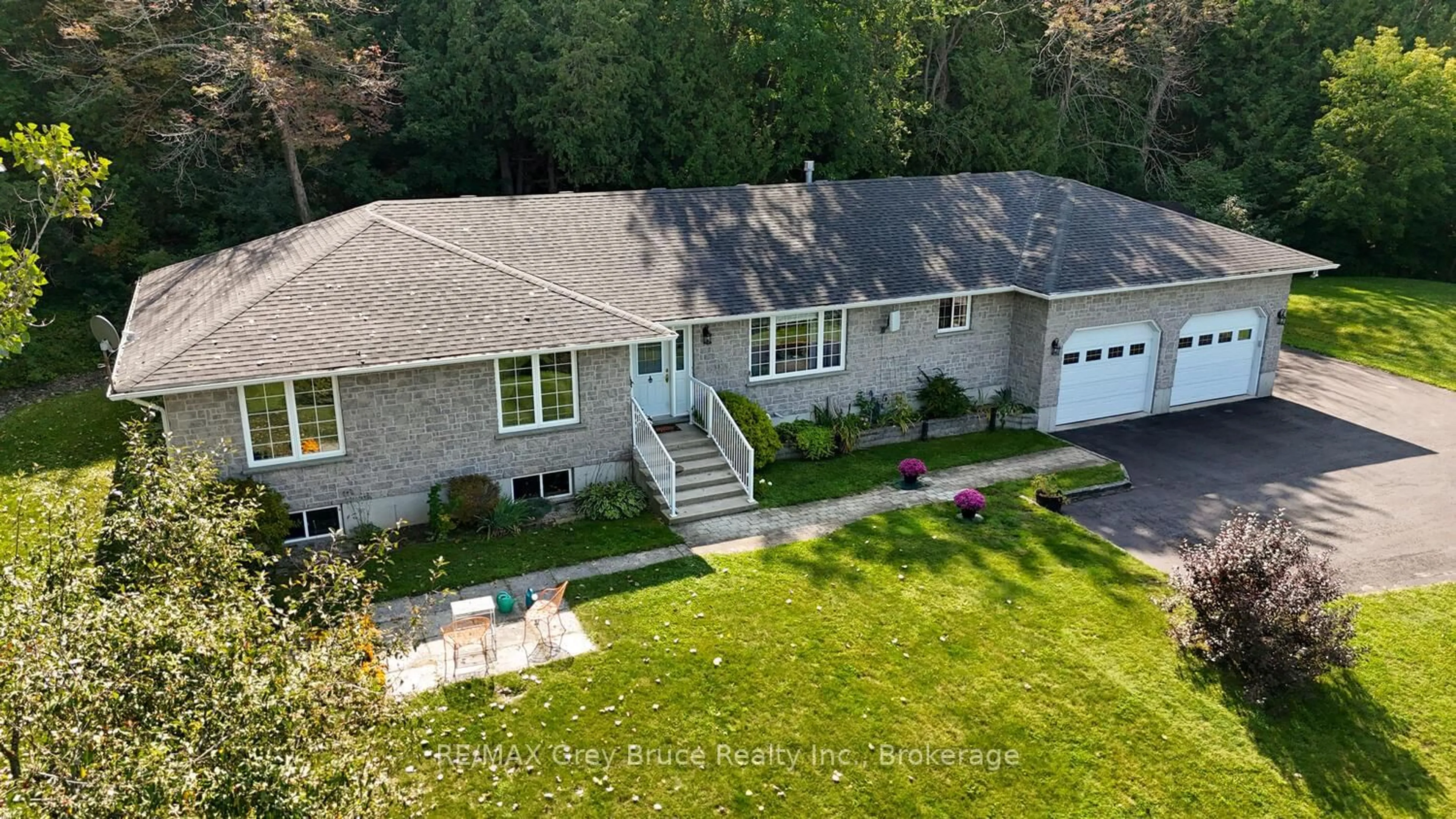 A pic from outside/outdoor area/front of a property/back of a property/a pic from drone, street for 501204 Grey 1 Rd, Georgian Bluffs Ontario N0H 2T0