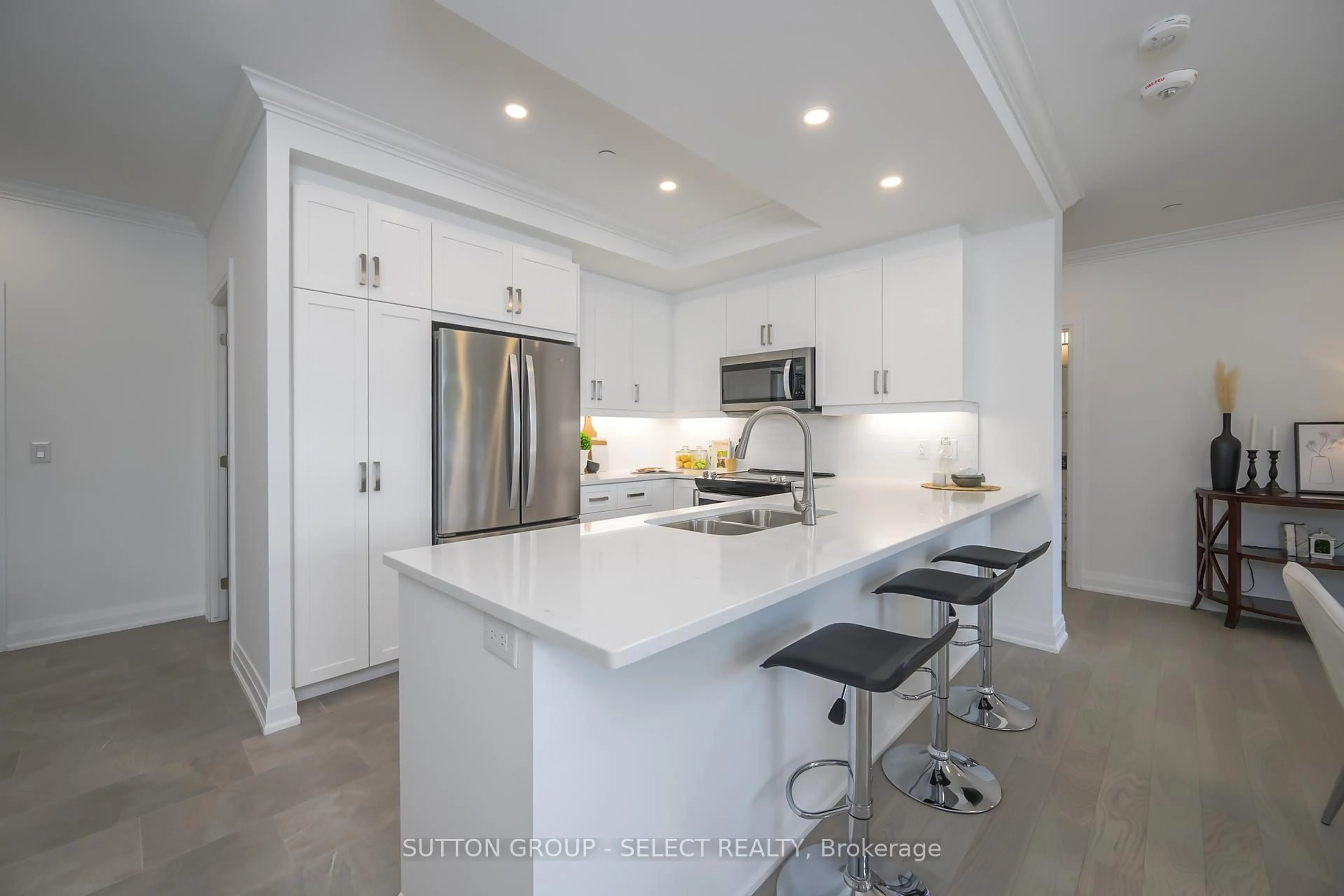 Open concept kitchen, ceramic/tile floor for 1975 Fountain Grass Dr #207, London South Ontario N6K 0M3