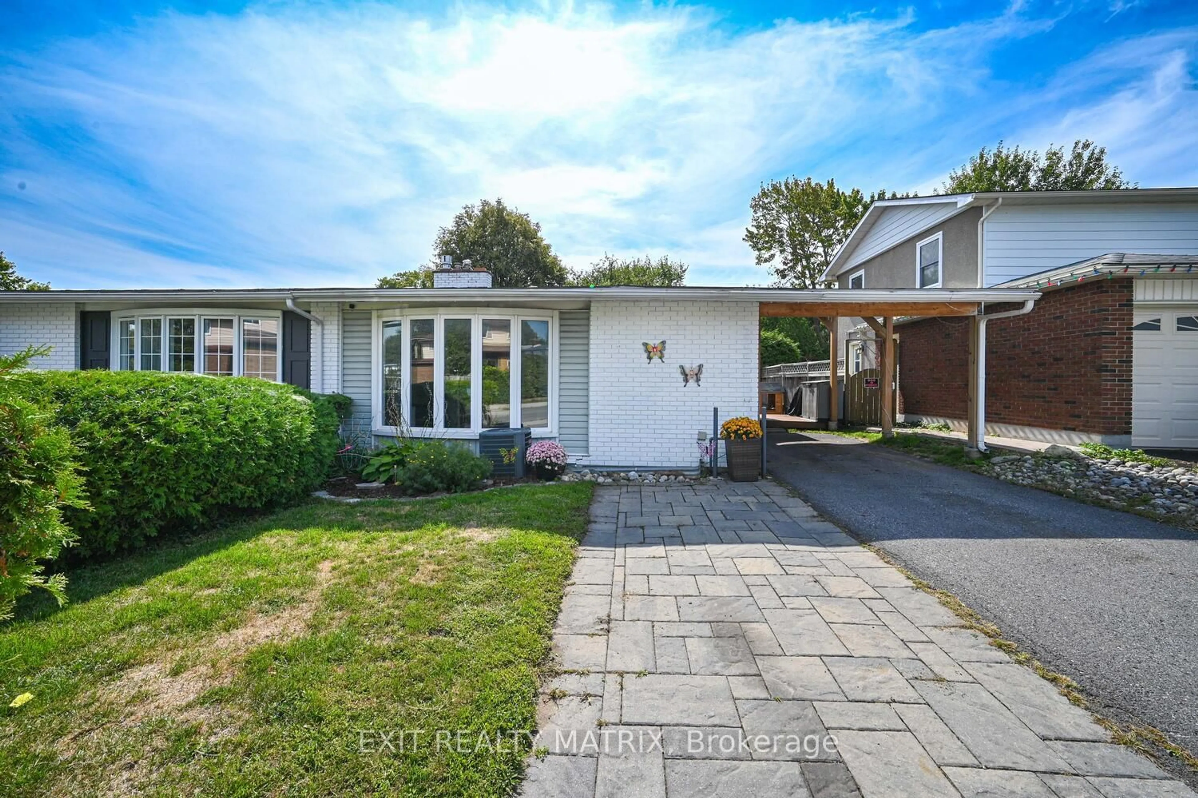 Home with vinyl exterior material, street for 90 Chesterton Dr, Ottawa Ontario K2E 5T6