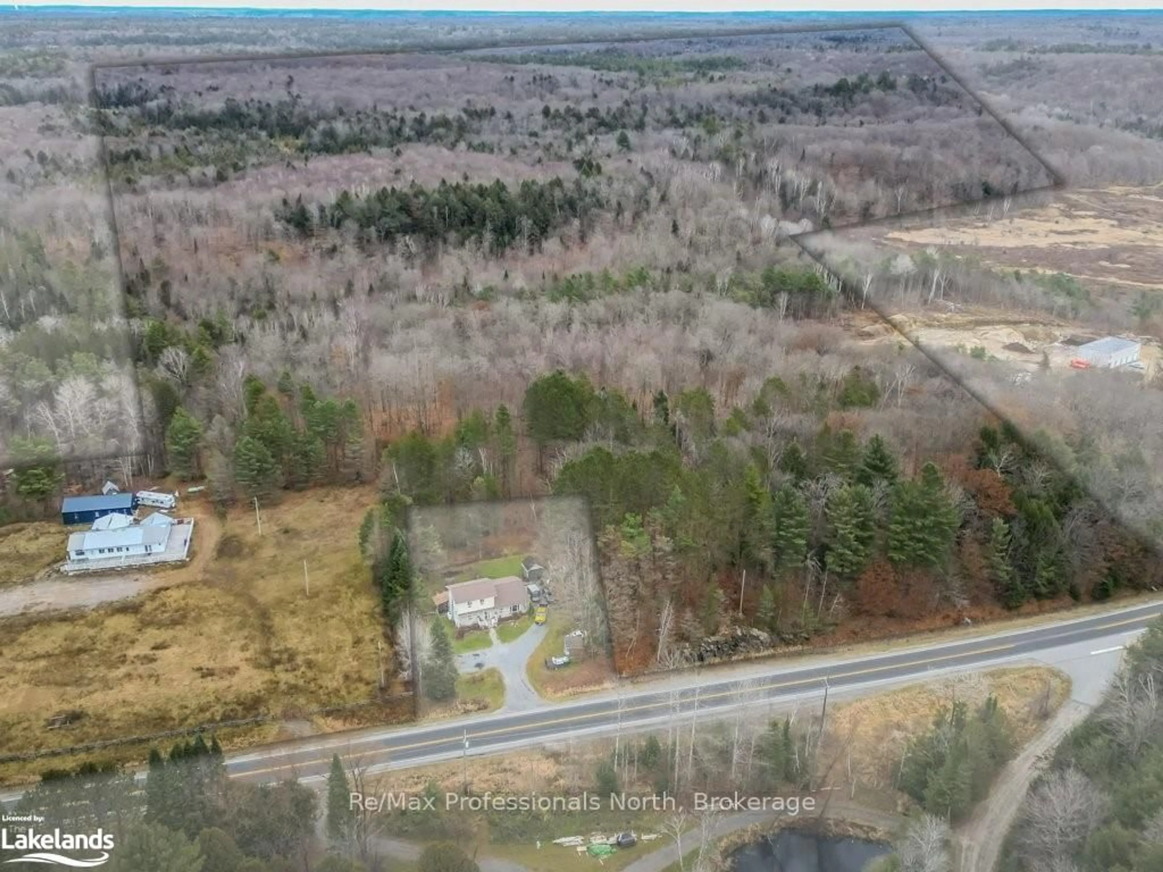 A pic from outside/outdoor area/front of a property/back of a property/a pic from drone, water/lake/river/ocean view for 2180-2186 HIGHWAY 141, Muskoka Lakes Ontario P0B 1M0
