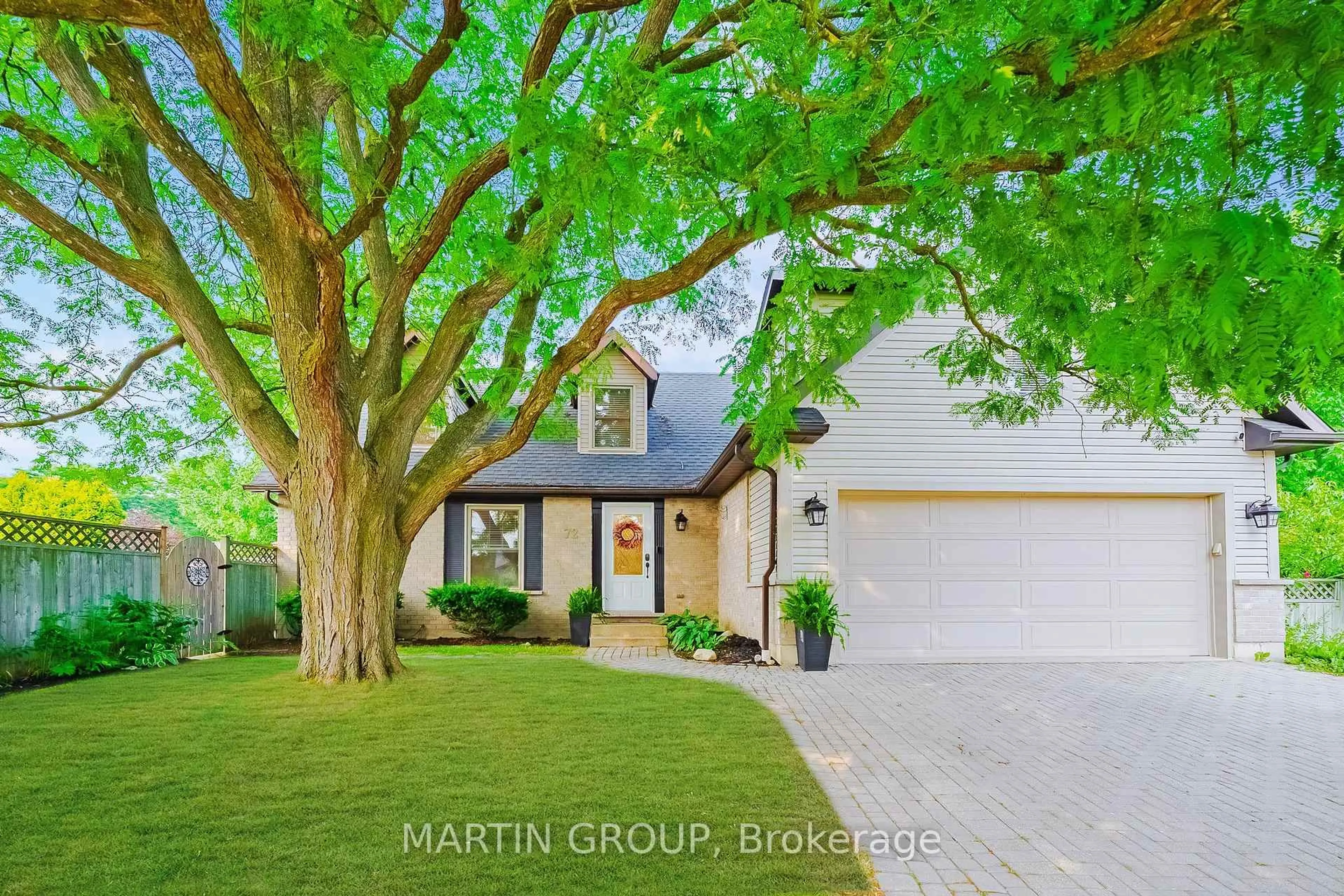 Home with brick exterior material, street for 72 McElderry Rd, Guelph Ontario N1G 4J5
