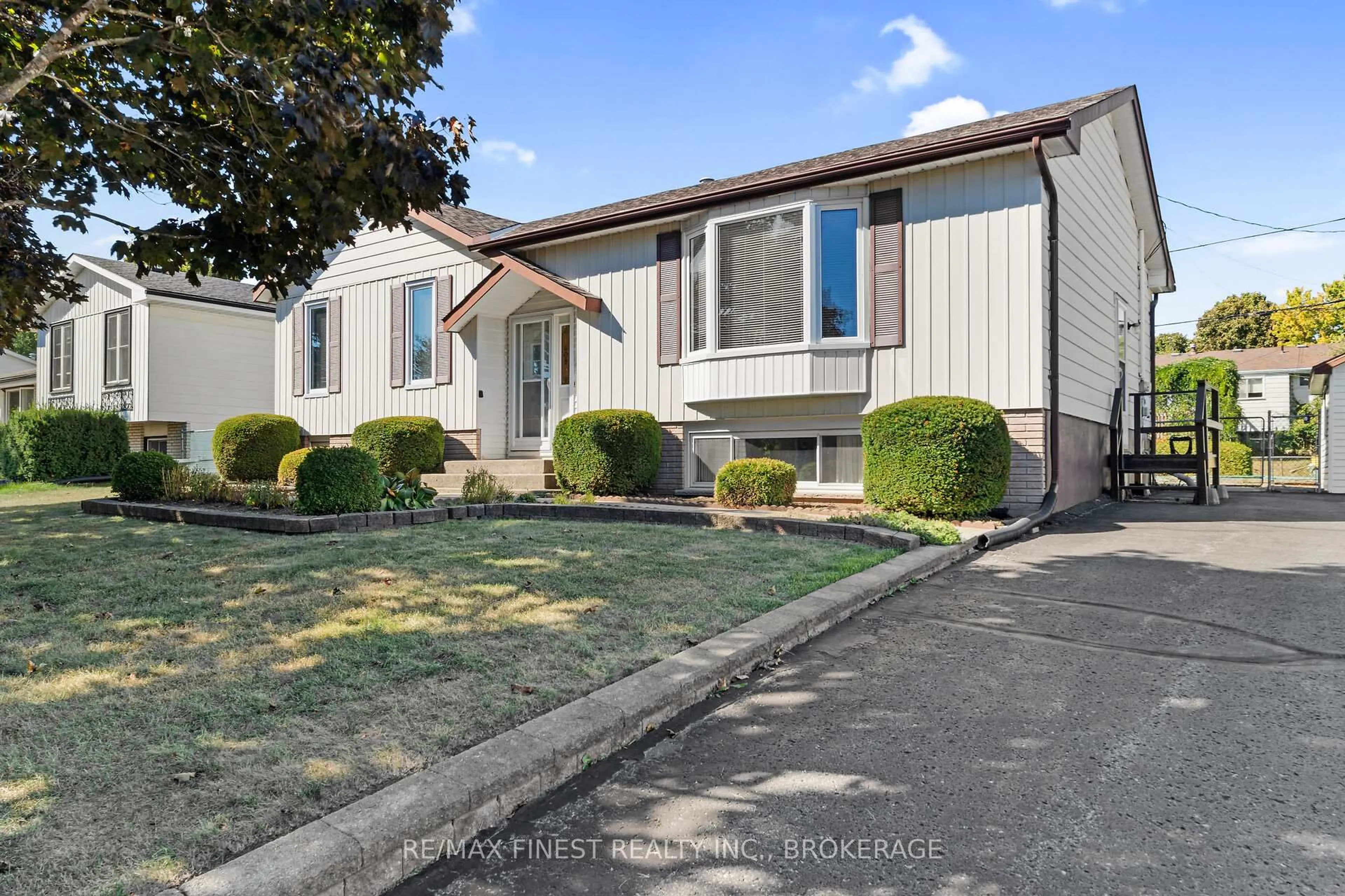 Home with vinyl exterior material, street for 7 Huff Ave, Loyalist Ontario K7N 1S5