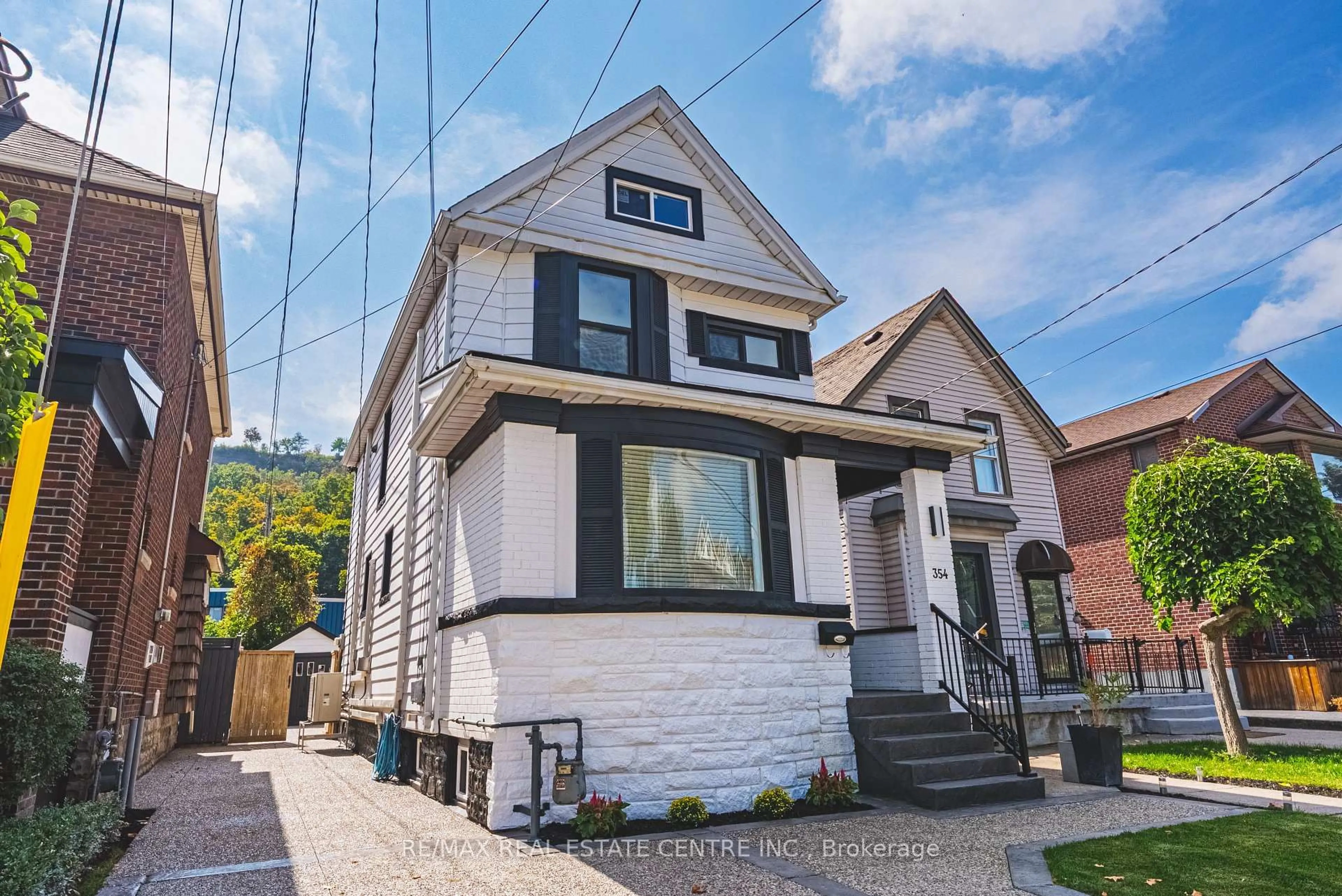 Home with brick exterior material, street for 354 Cumberland Ave, Hamilton Ontario L8M 2A2
