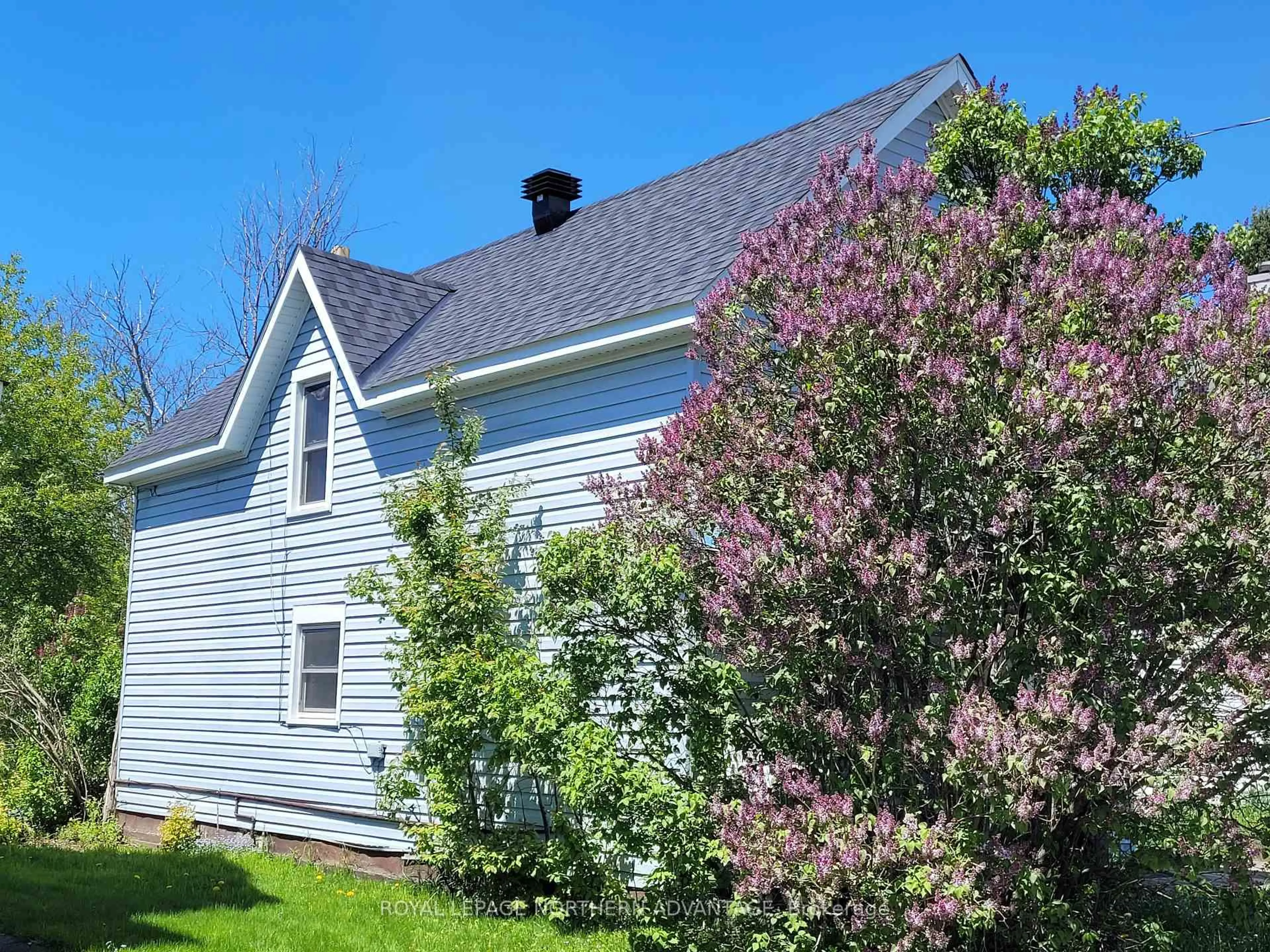 Home with vinyl exterior material, street for 63 Walnut St, Sault Ste Marie Ontario P6B 2E4