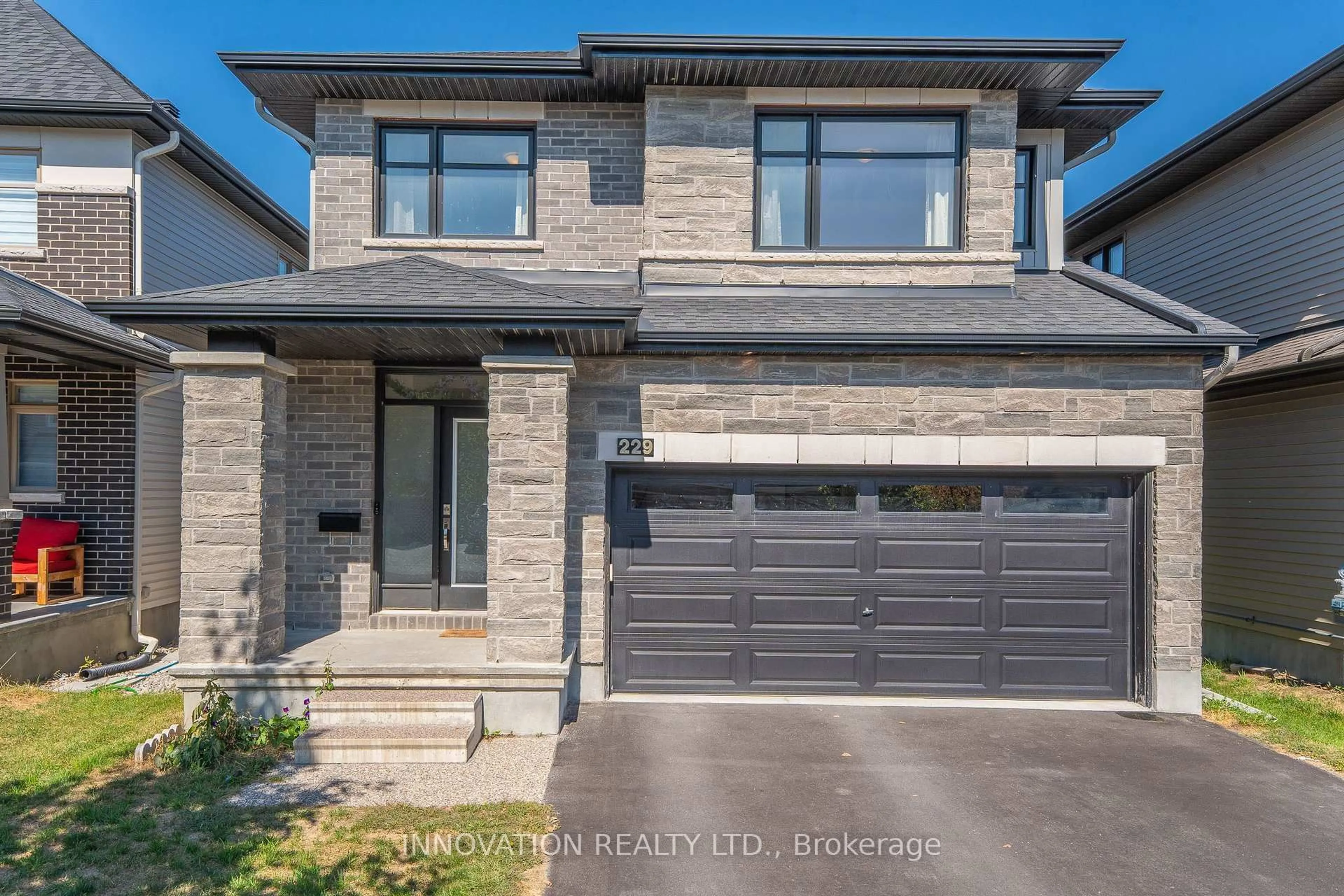 Home with brick exterior material, street for 229 Osterley Way, Ottawa Ontario K2S 2P2