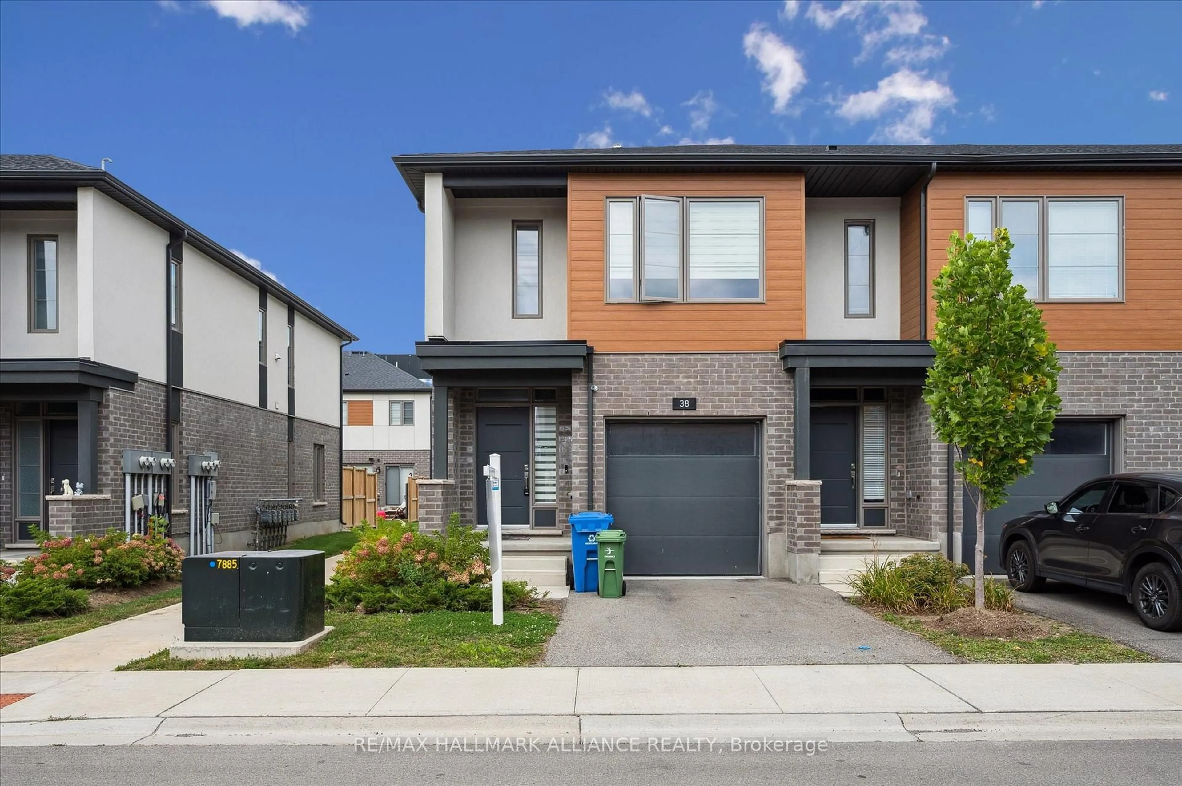 Home with brick exterior material, street for 38 Steele Cres, Guelph Ontario N1E 0S7