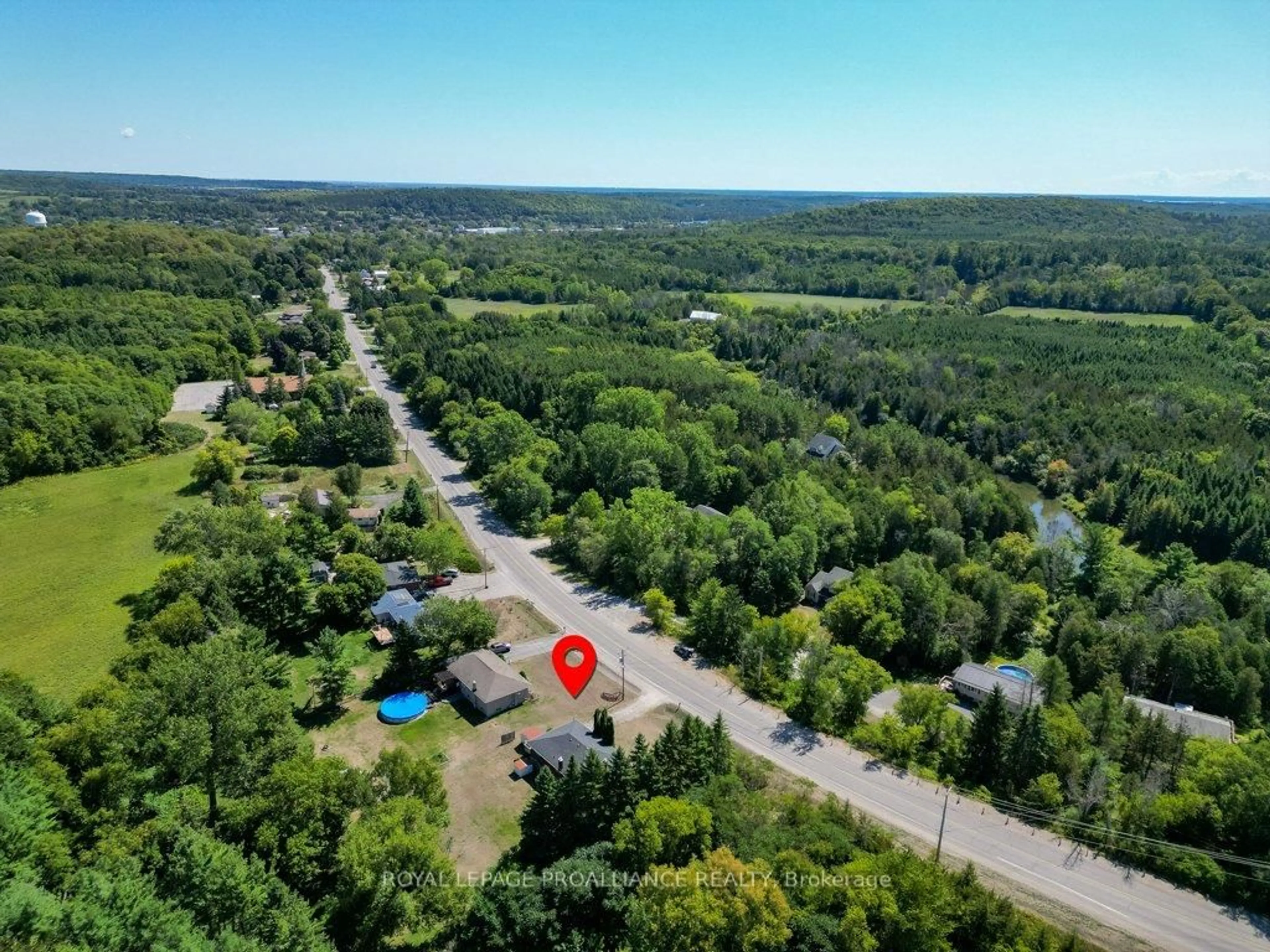 A pic from outside/outdoor area/front of a property/back of a property/a pic from drone, forest/trees view for 350 Mill St, Hastings Ontario K0K 2C0