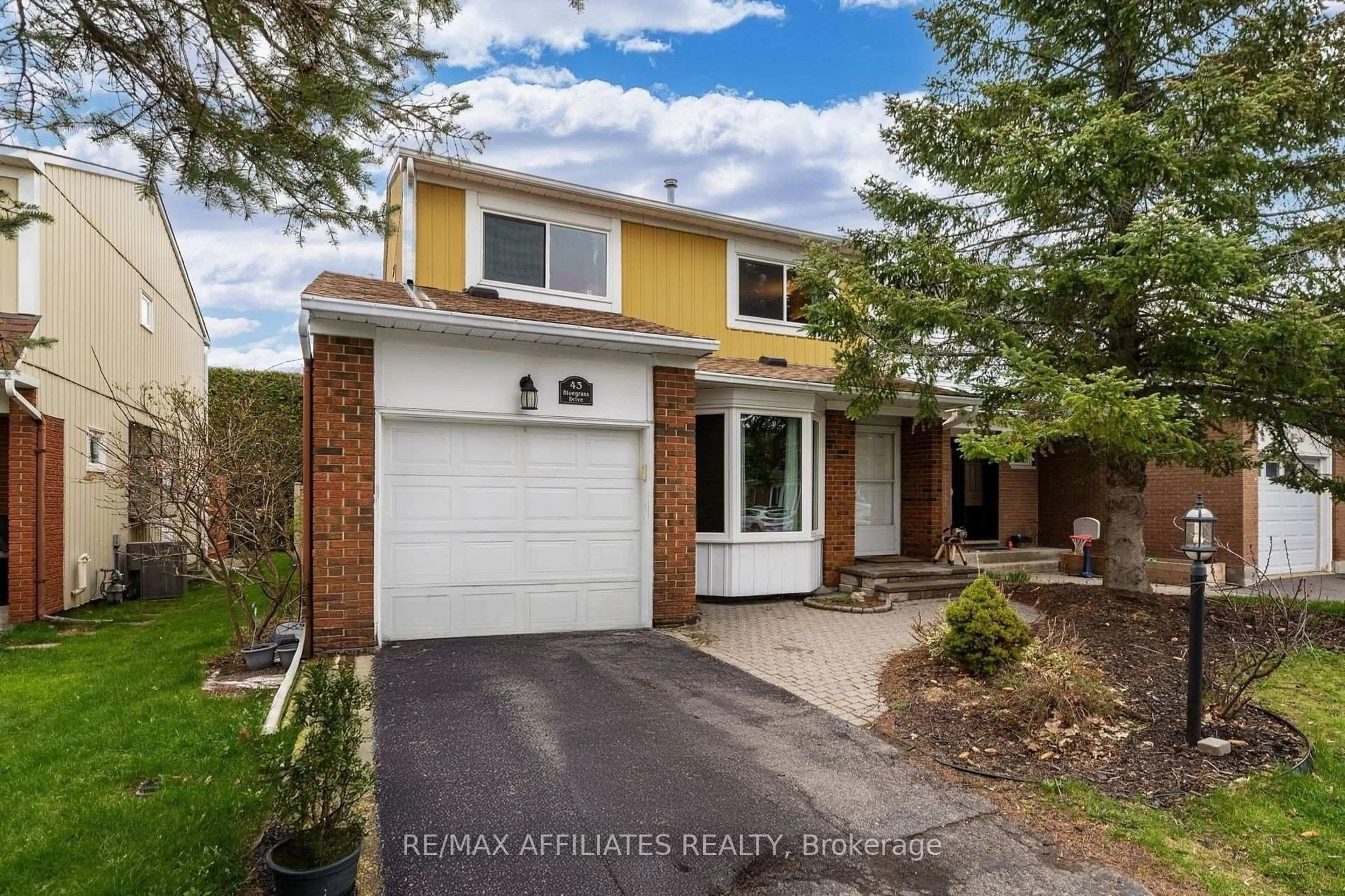 Home with brick exterior material, street for 43 Bluegrass Dr, Ottawa Ontario K2M 1G2