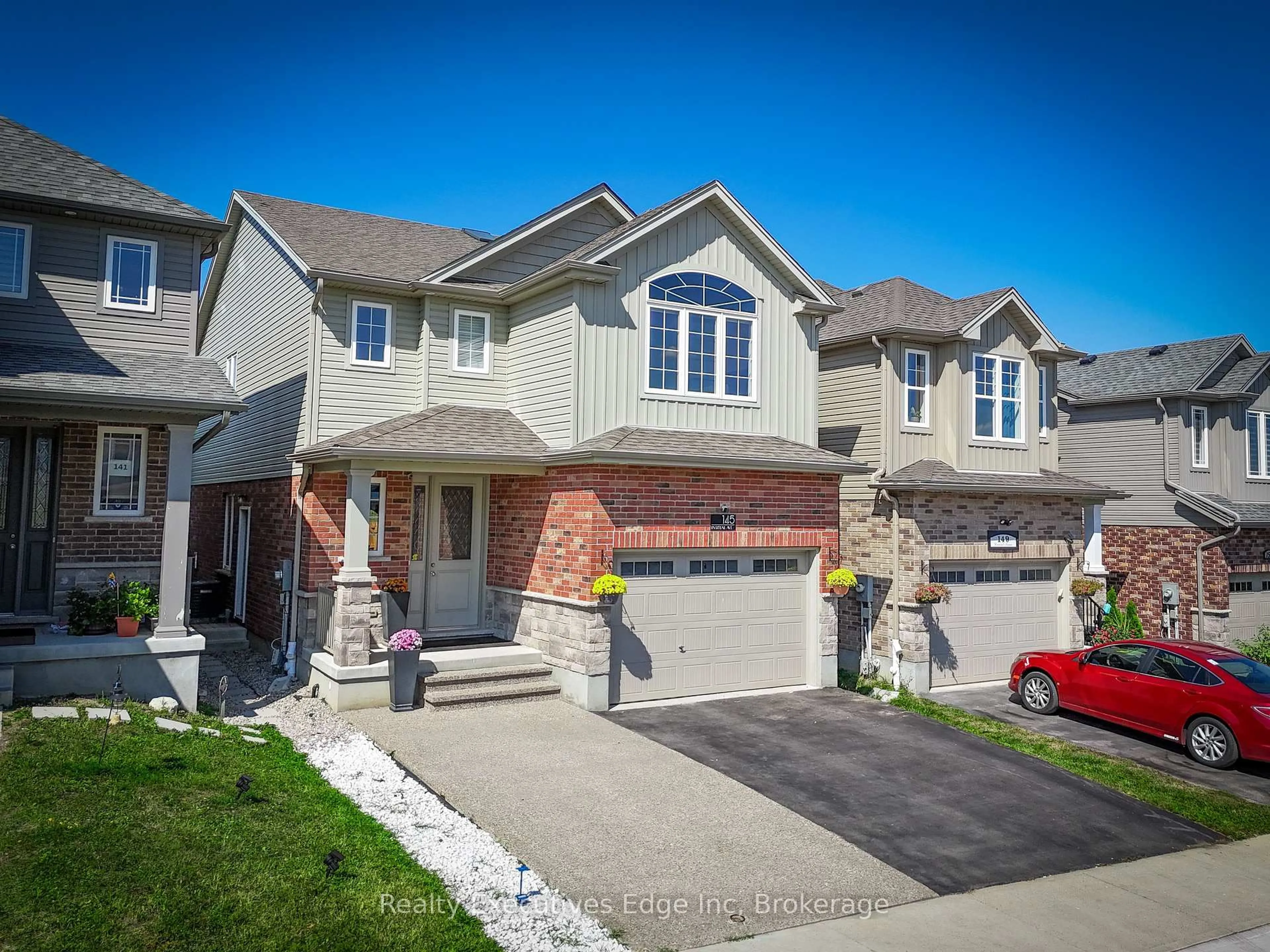 Home with brick exterior material, street for 145 Rivertrail Ave, Kitchener Ontario N2A 0J7