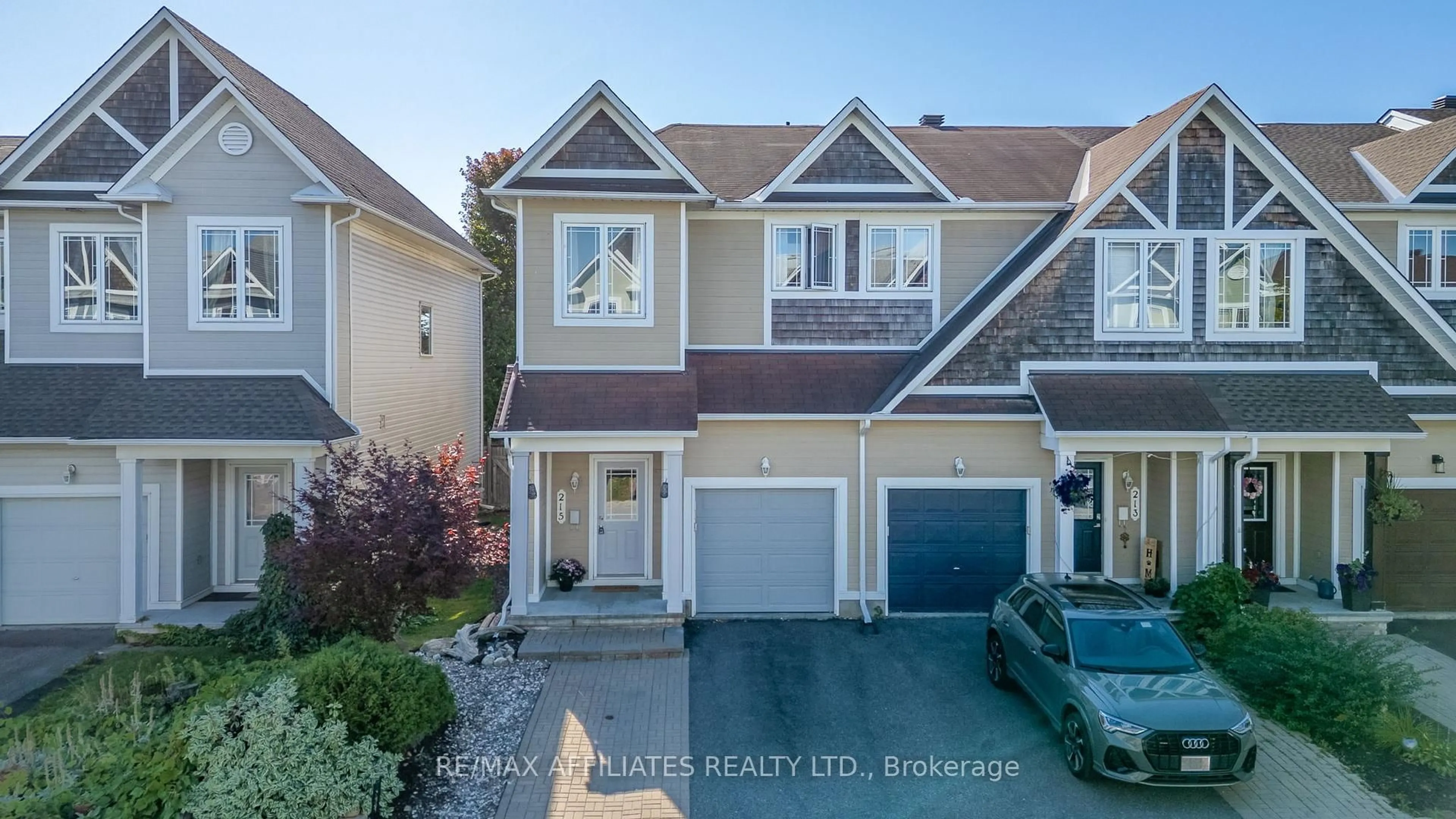 Home with vinyl exterior material, street for 215 Catamount Crt, Ottawa Ontario K2M 0A8
