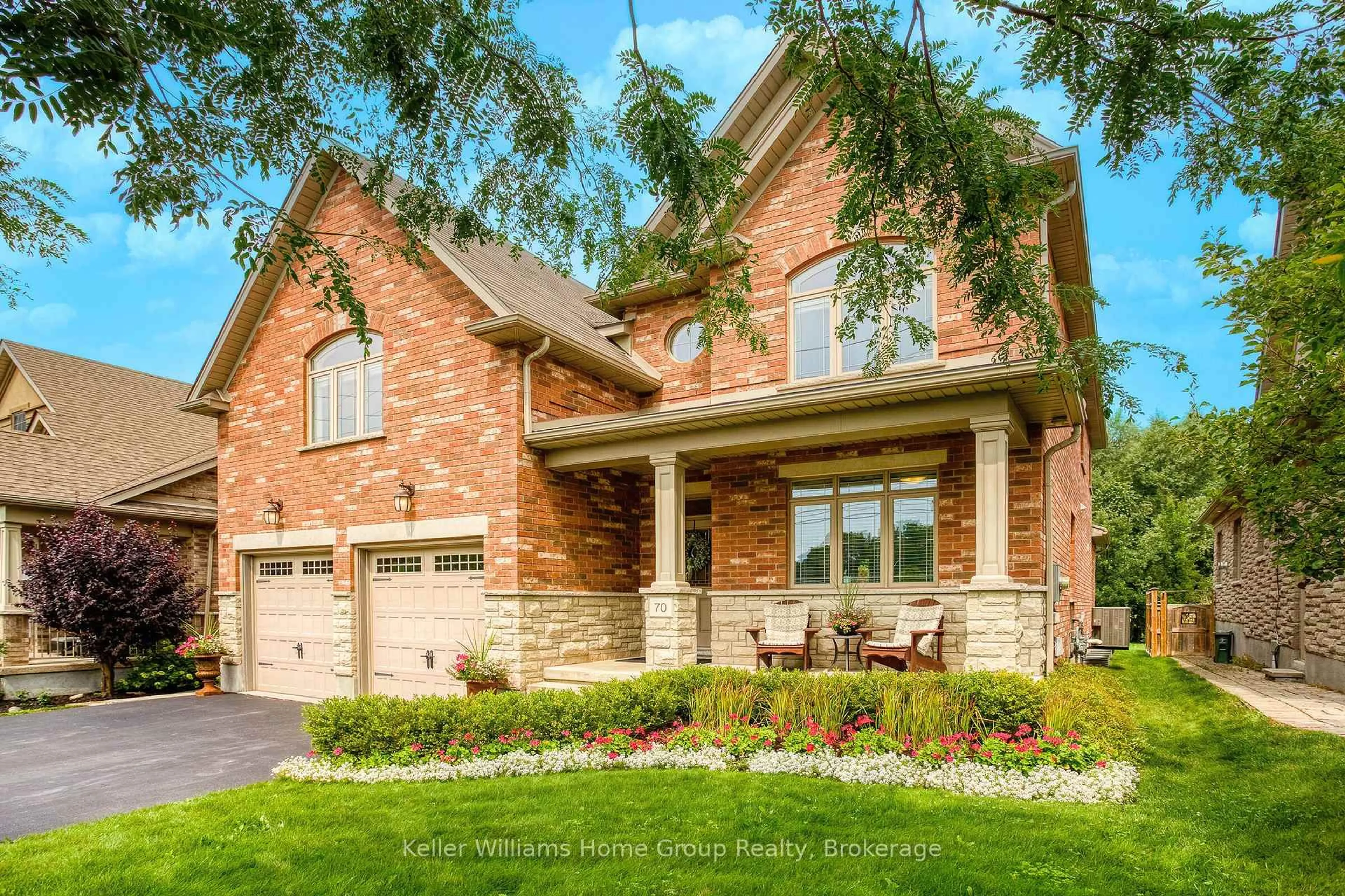 Home with brick exterior material, street for 70 Waverley Dr, Guelph Ontario N1E 6C8