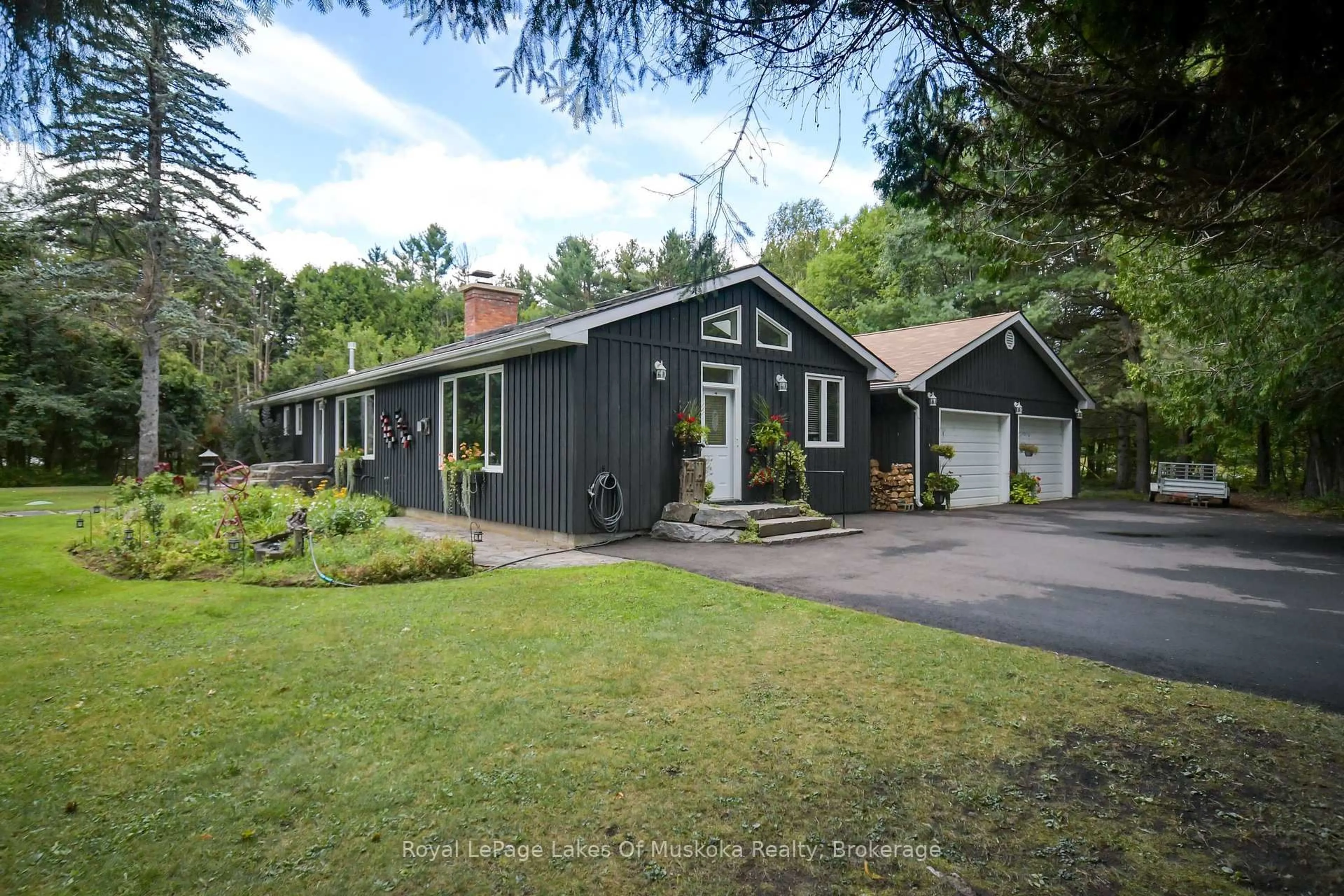 Home with vinyl exterior material, street for 2 Leslie Dr, Bracebridge Ontario P1L 1W8