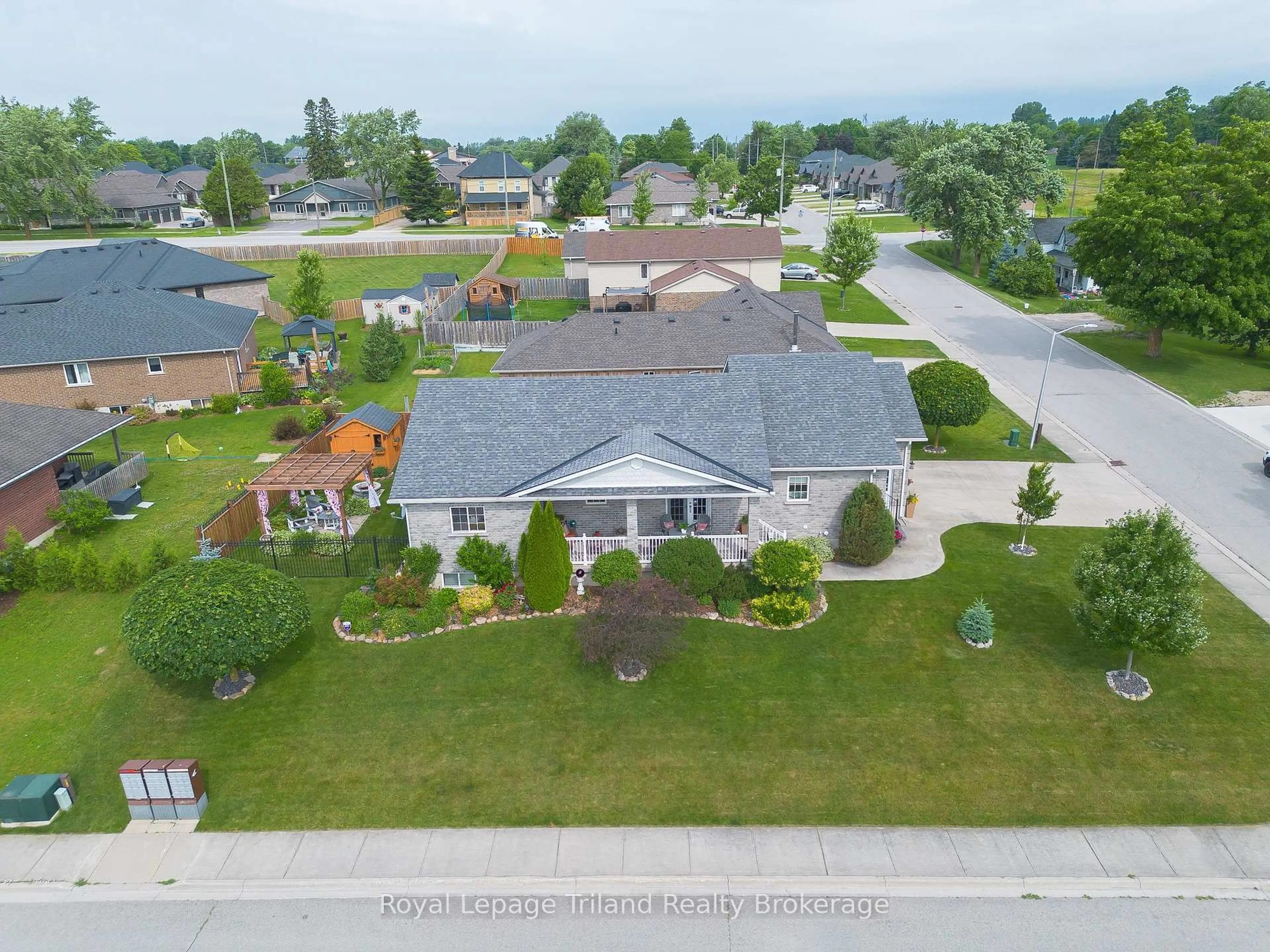 A pic from outside/outdoor area/front of a property/back of a property/a pic from drone, street for 4 Clayton St, West Perth Ontario N0K 1N0