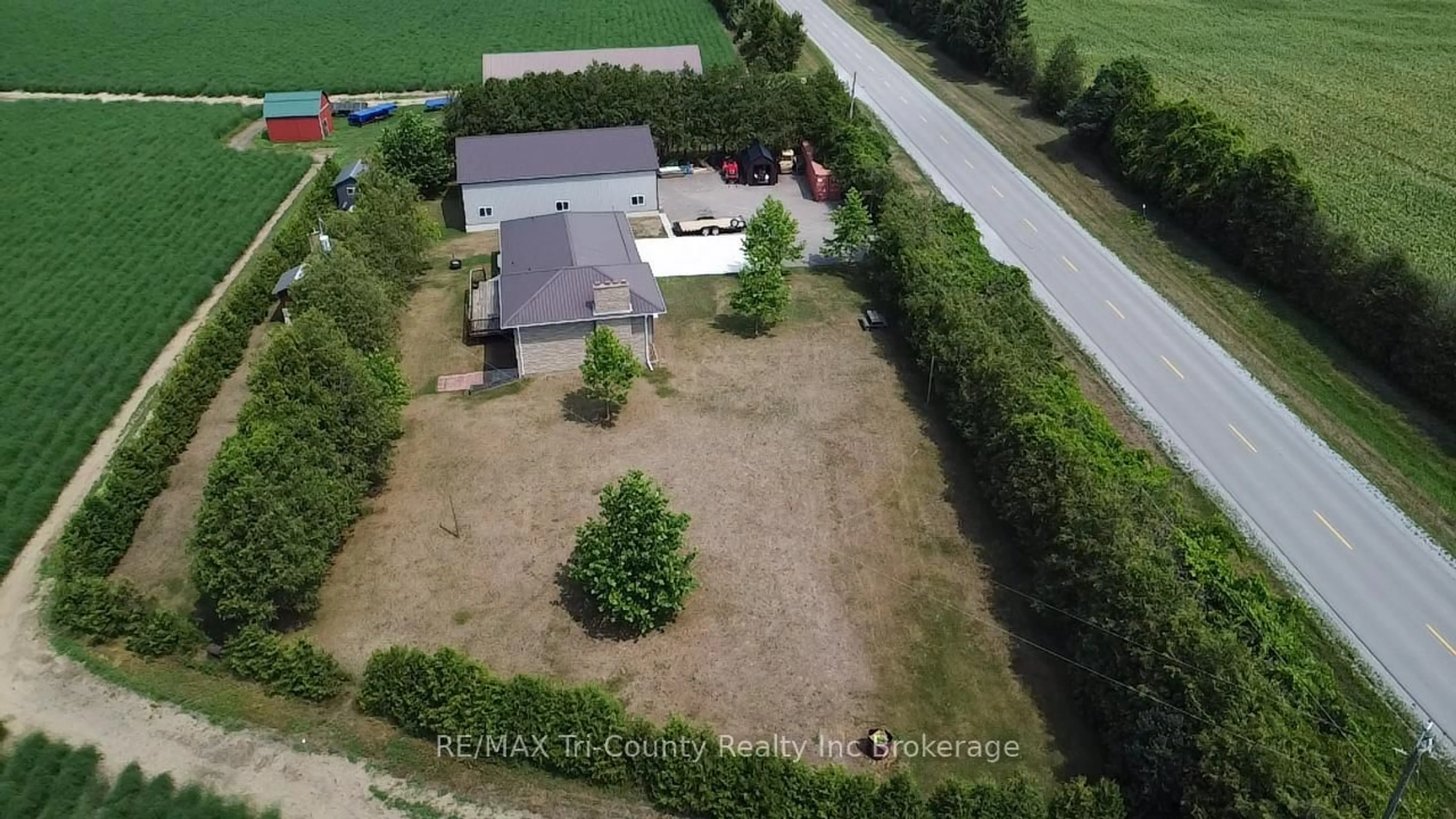A pic from outside/outdoor area/front of a property/back of a property/a pic from drone, unknown for 305 Norfolk County 28 Rd, Norfolk Ontario N0E 1G0