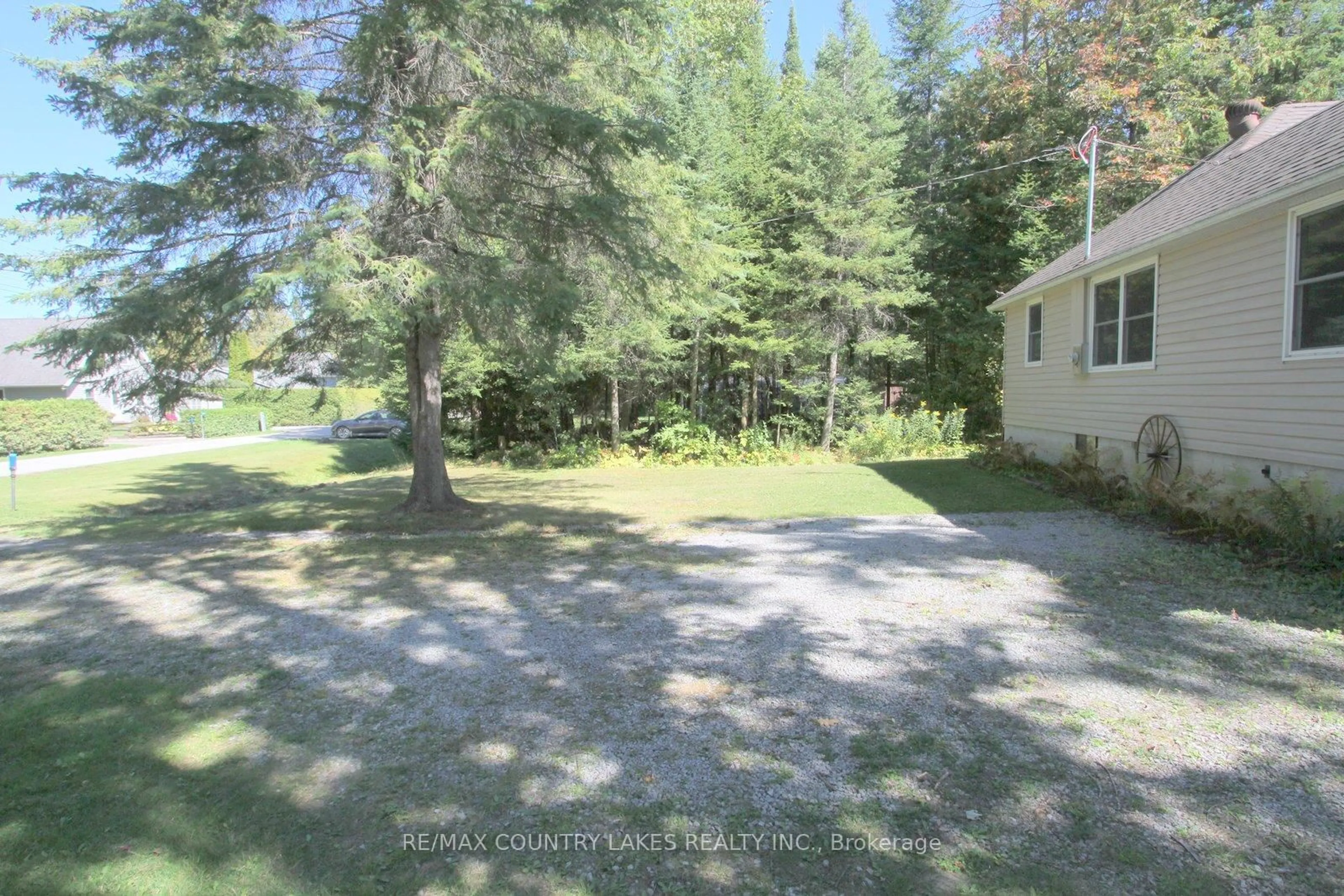 A pic from outside/outdoor area/front of a property/back of a property/a pic from drone, forest/trees view for 62 Paradise Rd, Kawartha Lakes Ontario K0M 1B0