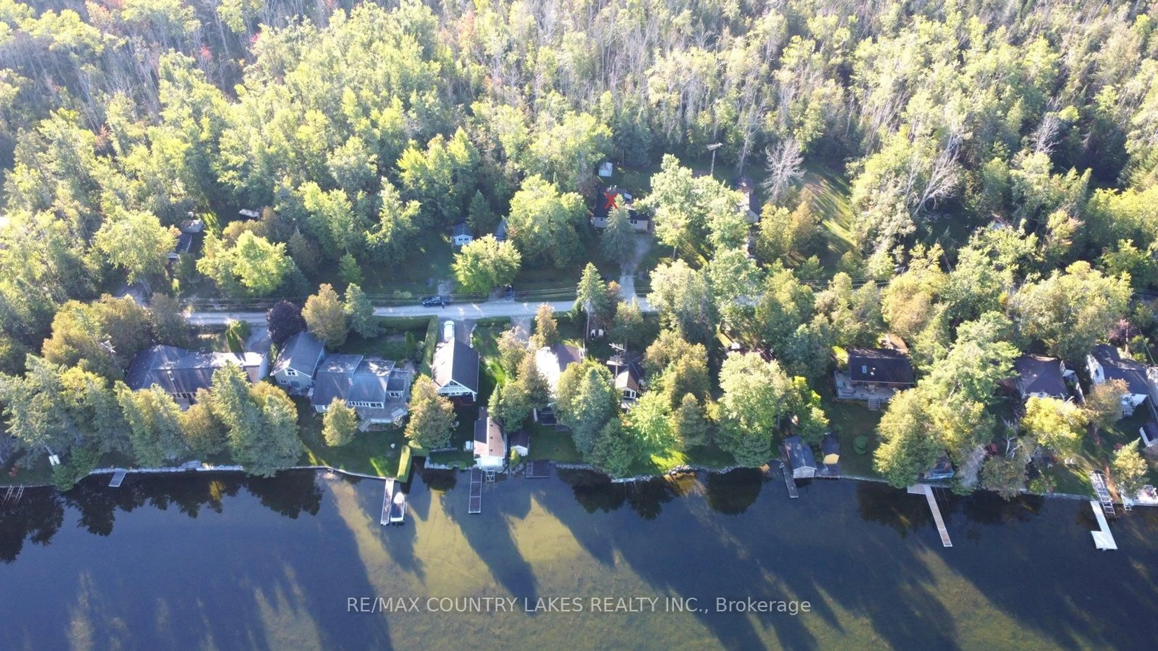 A pic from outside/outdoor area/front of a property/back of a property/a pic from drone, water/lake/river/ocean view for 62 Paradise Rd, Kawartha Lakes Ontario K0M 1B0