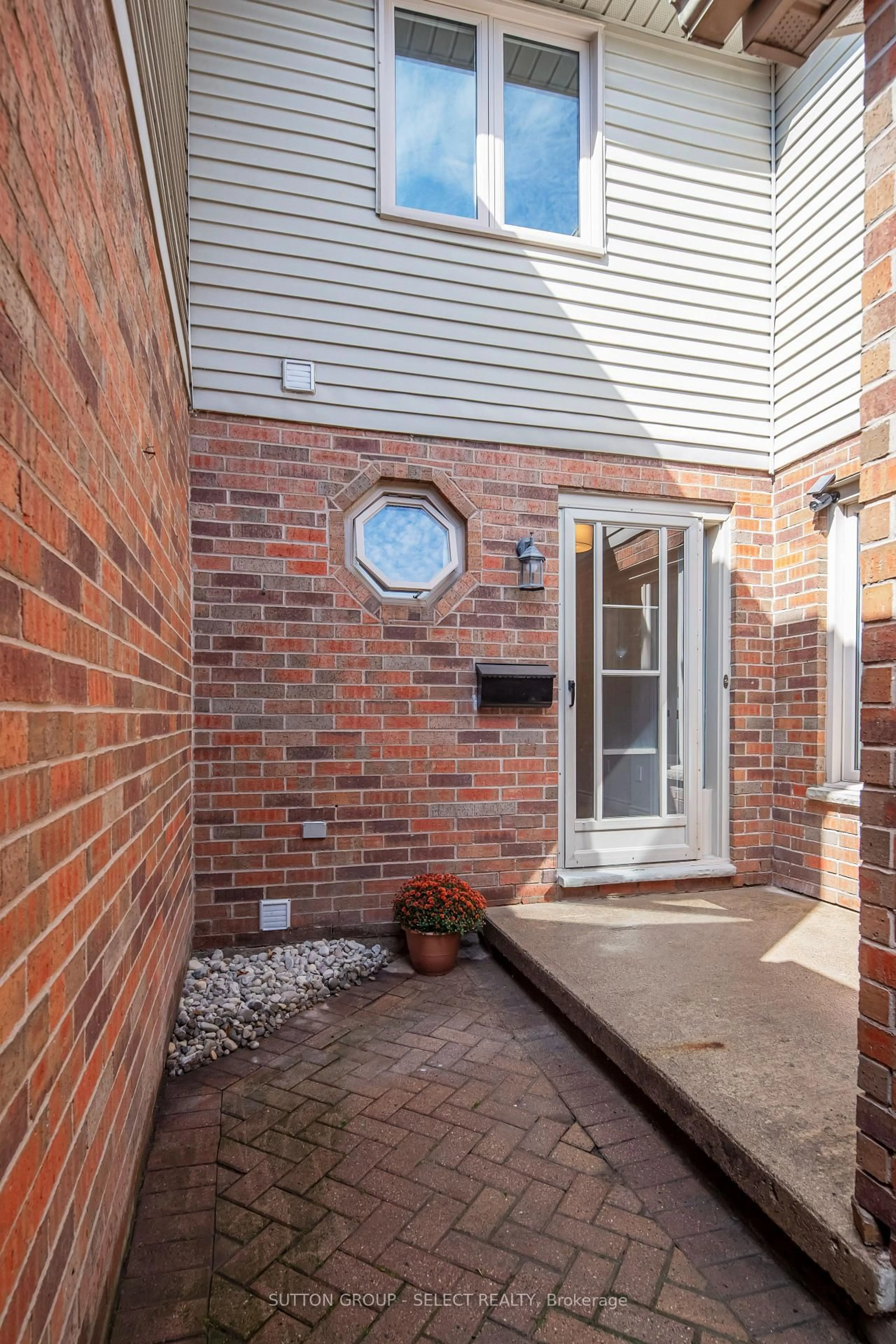Home with brick exterior material, street for 70 Sunnyside Dr #3, London North Ontario N5X 3W4