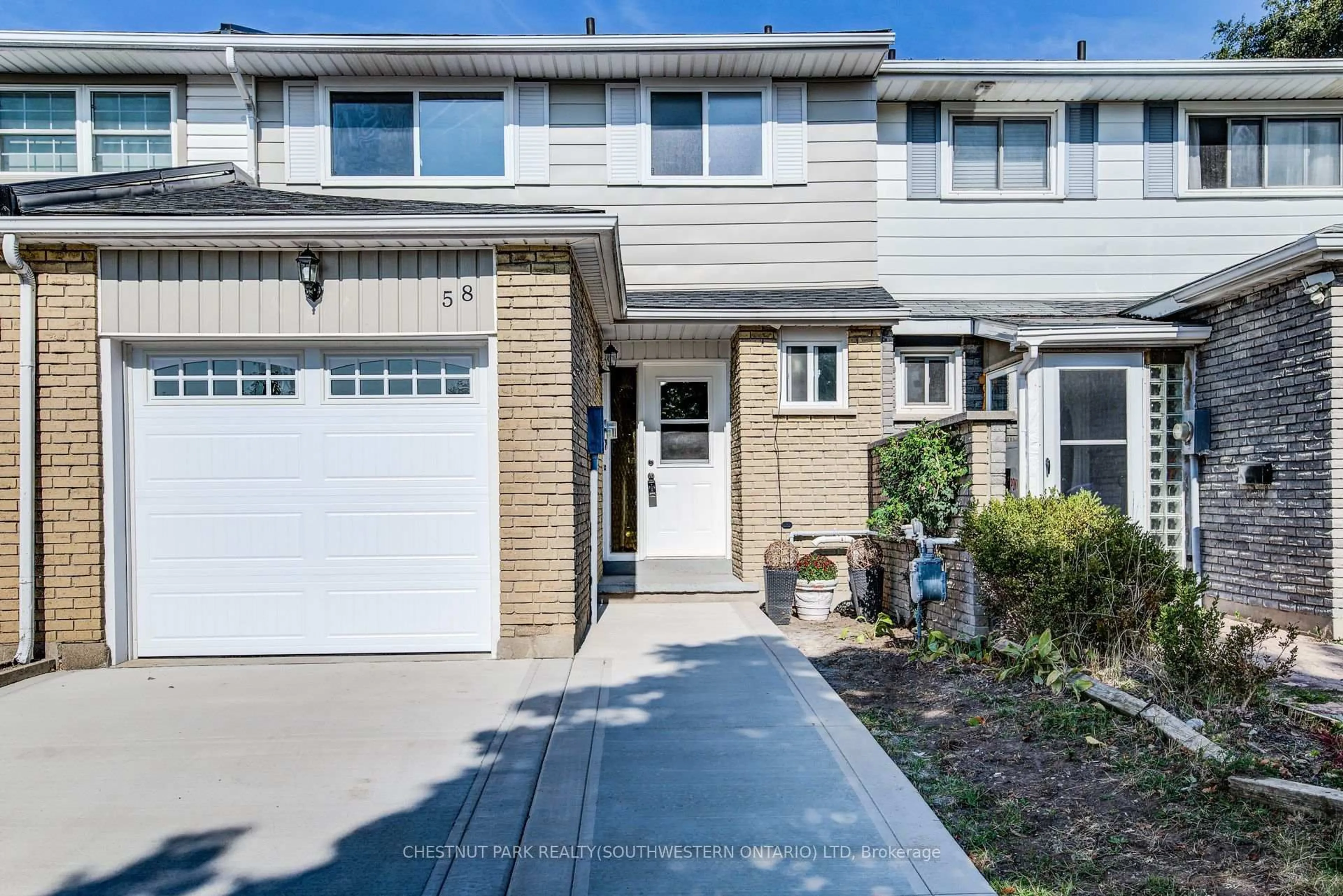 Home with vinyl exterior material, street for 58 Obermeyer Dr, Kitchener Ontario N2A 1P6