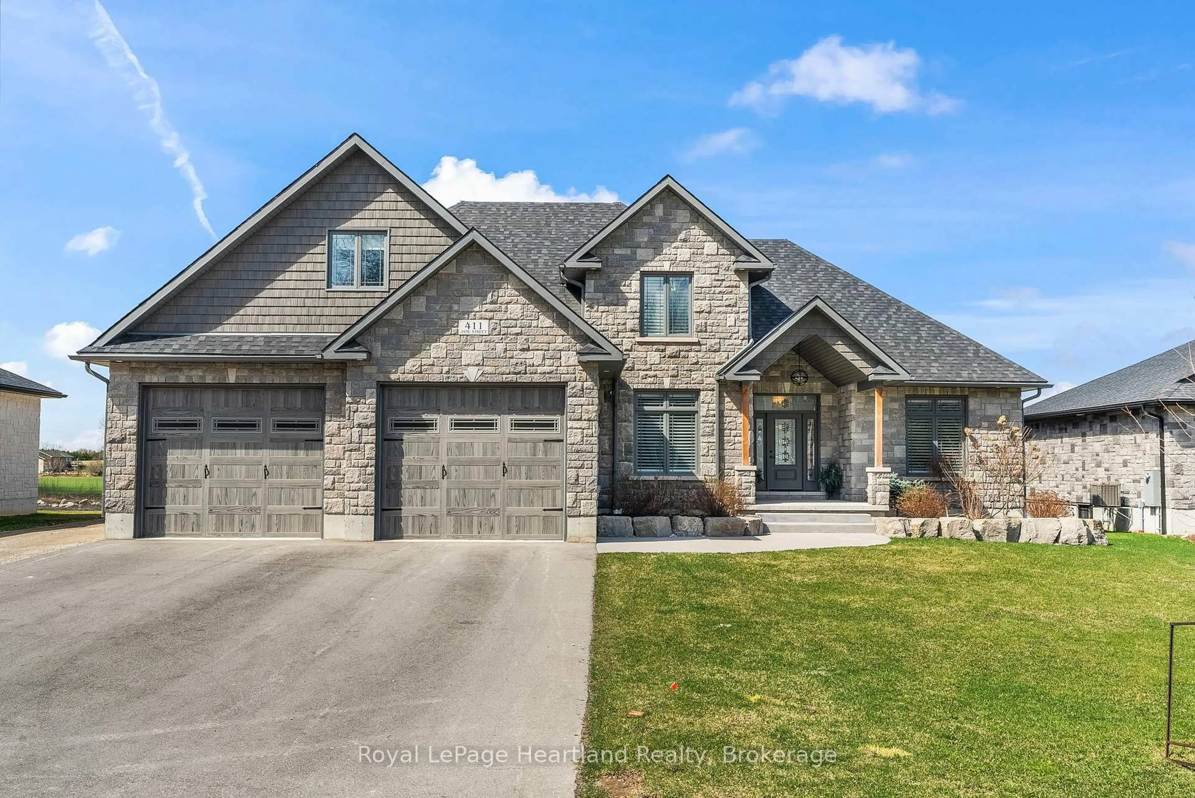 Home with brick exterior material, street for 411 JANE St, Minto Ontario N0G 2P0