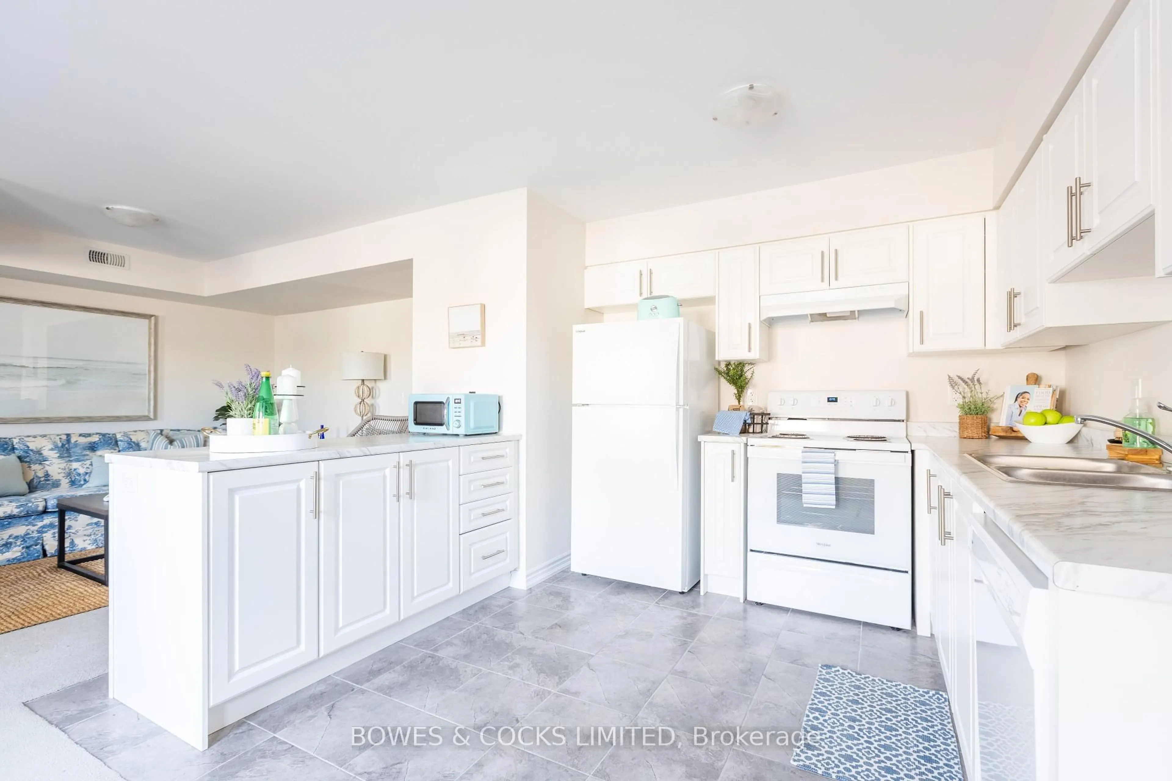 Open concept kitchen, ceramic/tile floor for 50 Maple St #102, Asphodel-Norwood Ontario K0L 2V0