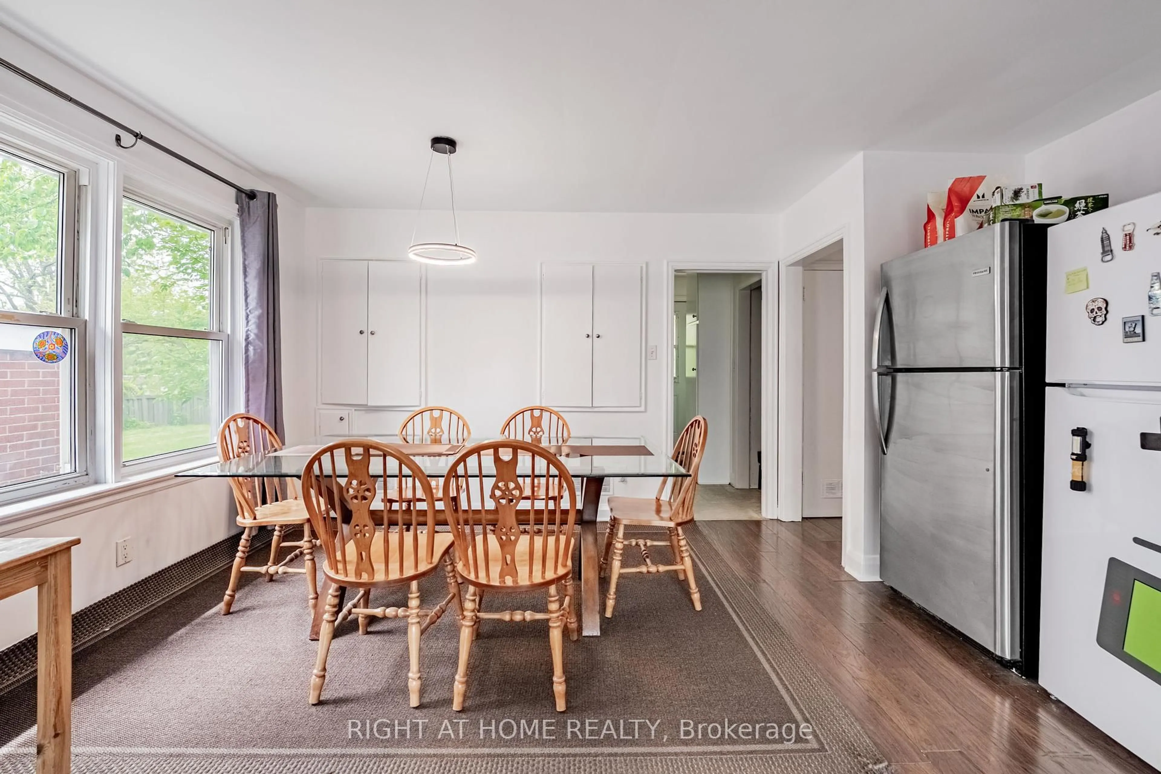 Dining room, wood/laminate floor for 194 Cline Ave, Hamilton Ontario L8S 1X4