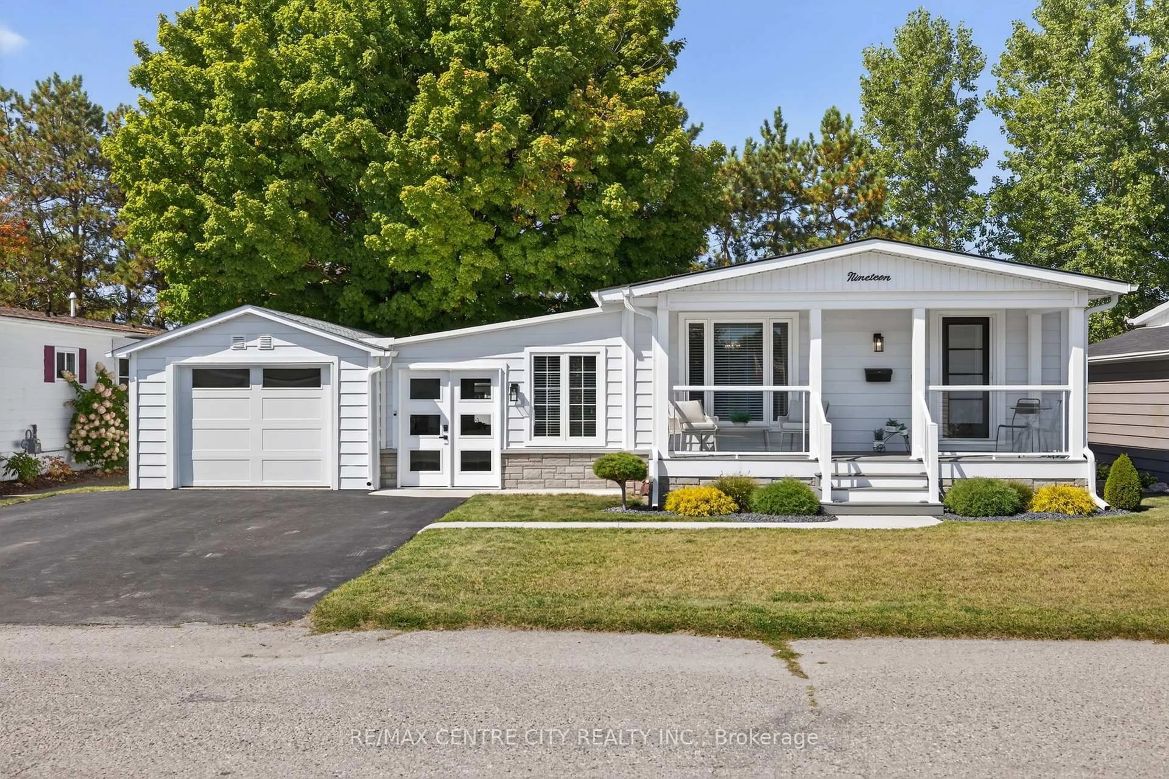 Home with vinyl exterior material, street for 19 Miller St, Strathroy-Caradoc Ontario N7G 3P4