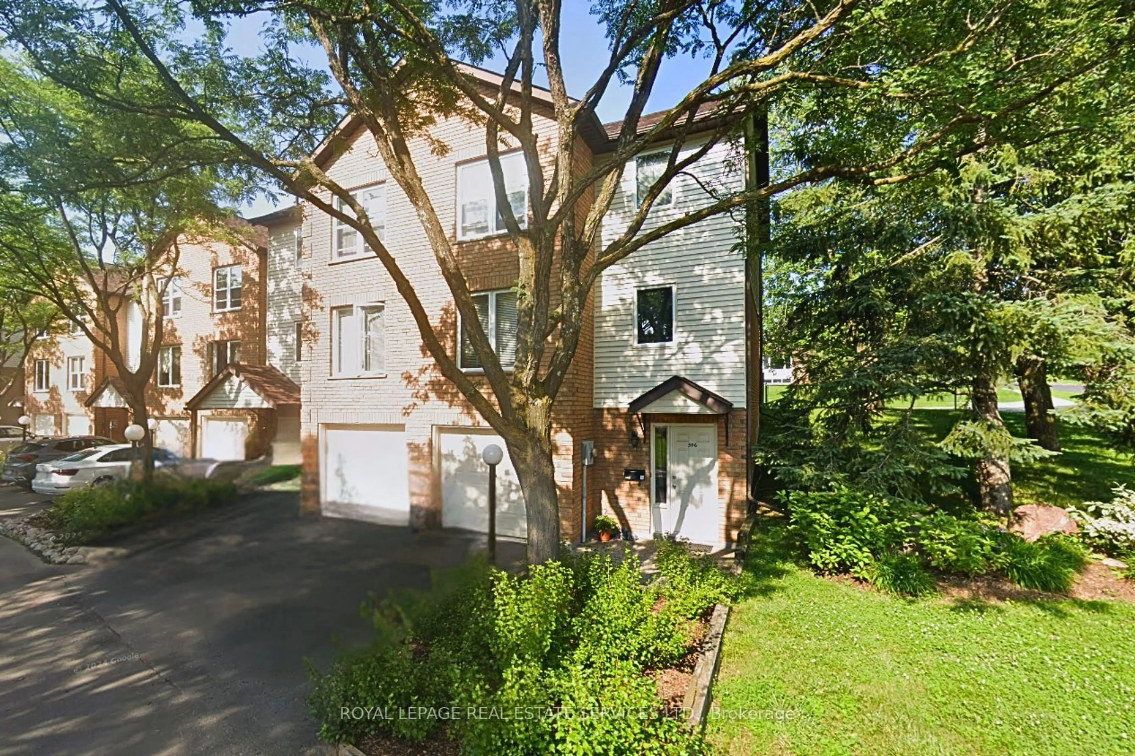 A pic from outside/outdoor area/front of a property/back of a property/a pic from drone, street for 2650 Marsdale Dr #506, Peterborough Ontario K9L 1Y2