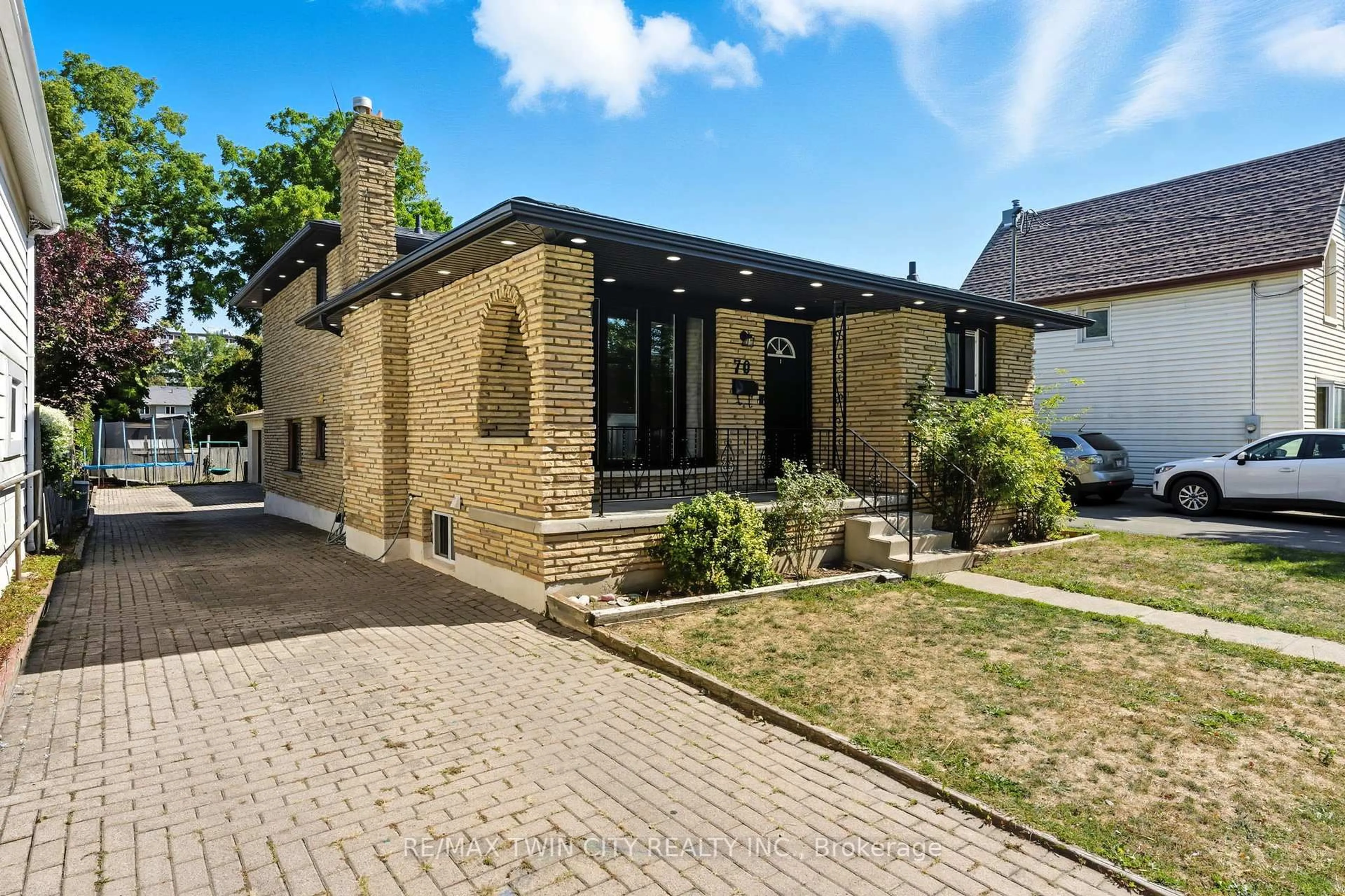 Home with brick exterior material, street for 70 Oak St, Brantford Ontario N3T 2B1