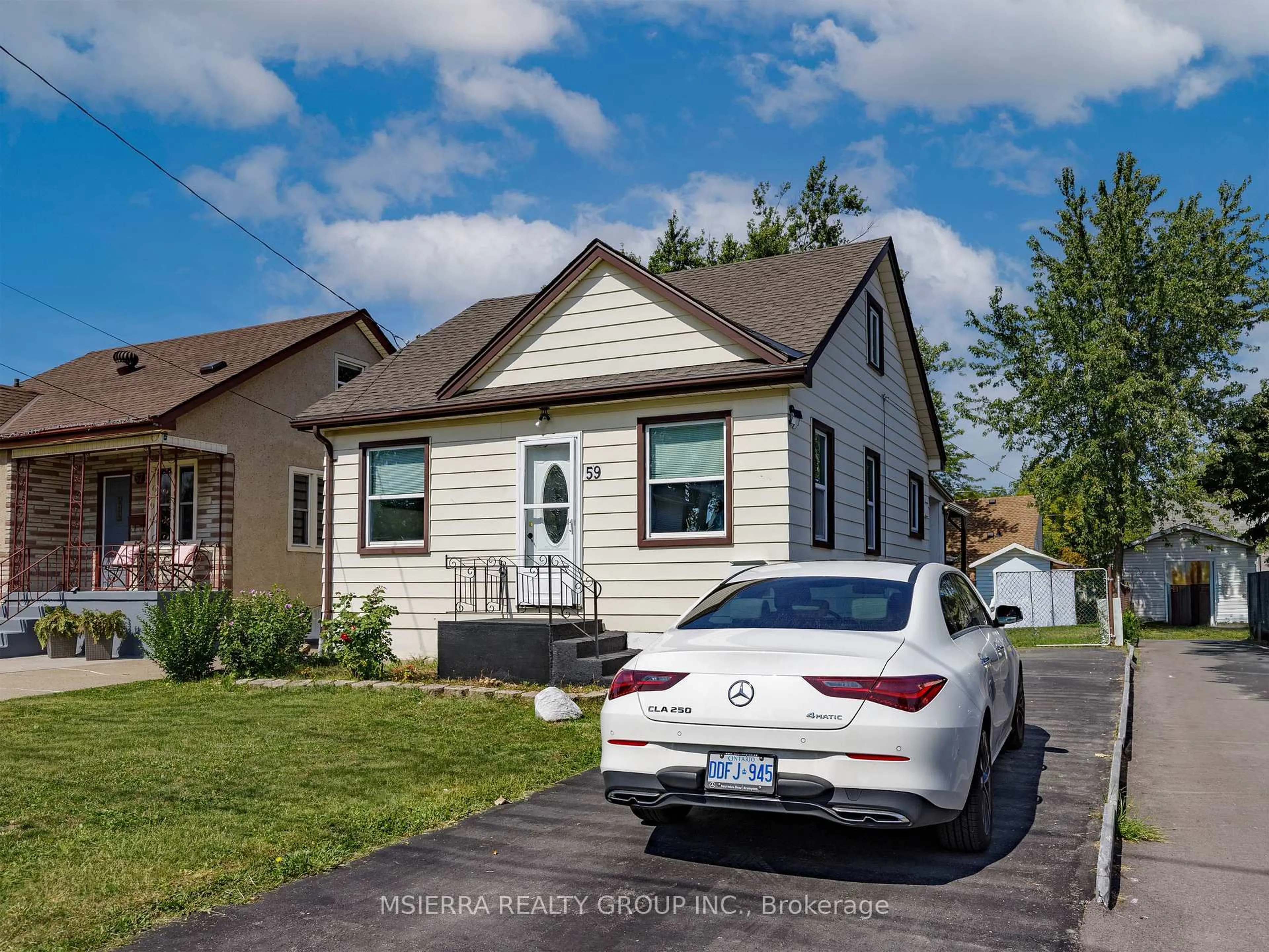 Home with vinyl exterior material, street for 59 Hamilton St, St. Catharines Ontario L2S 1K8