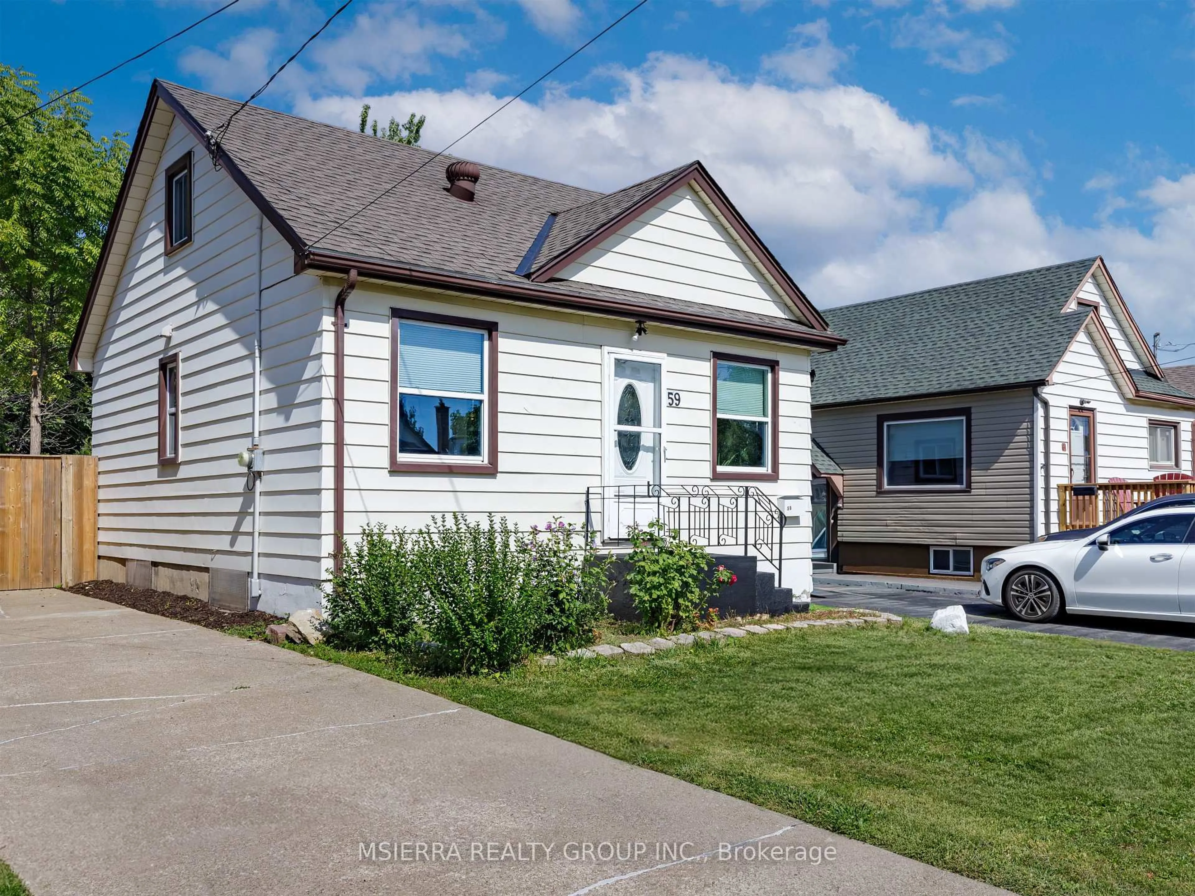 Home with vinyl exterior material, street for 59 Hamilton St, St. Catharines Ontario L2S 1K8