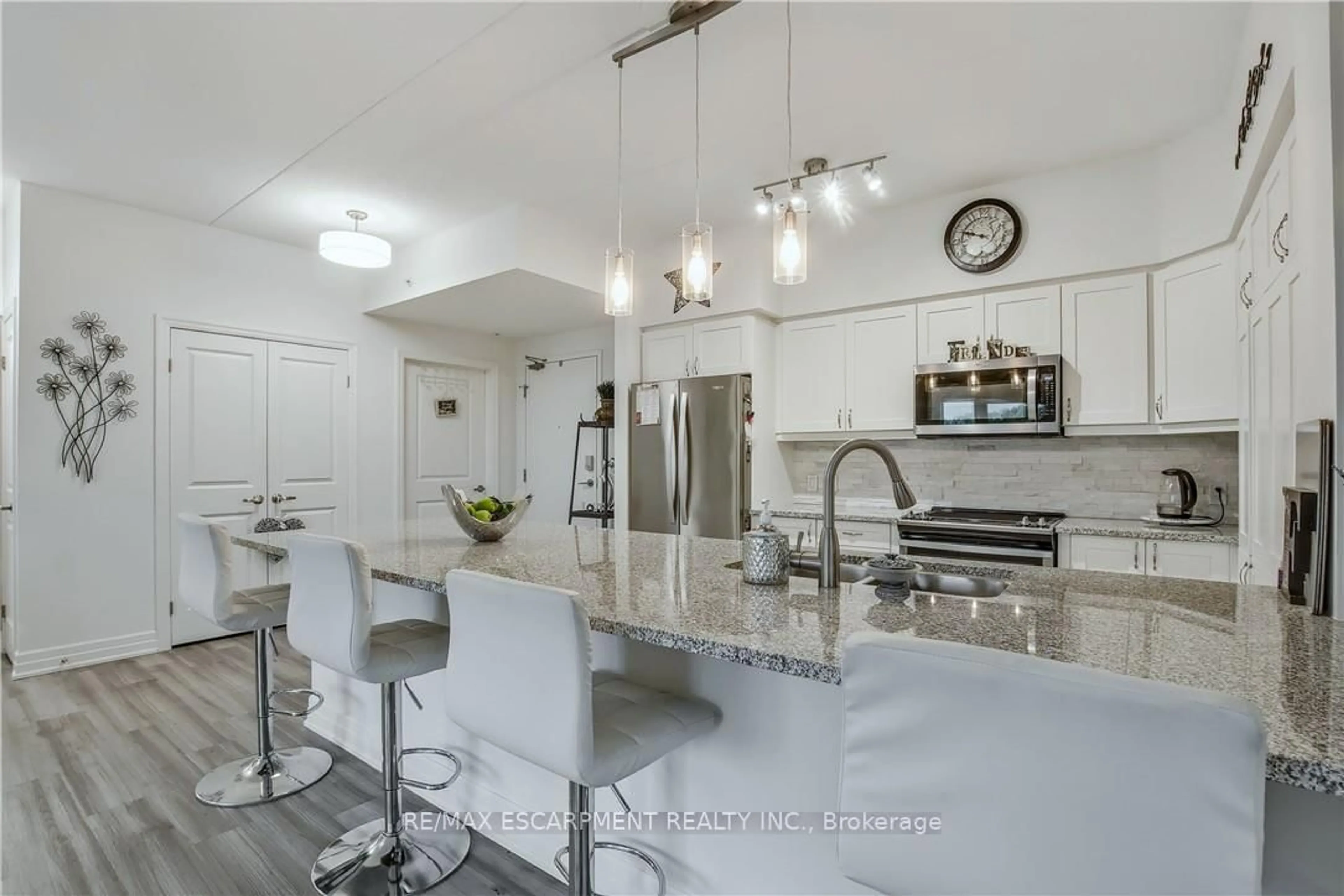 Open concept kitchen, ceramic/tile floor for 39 Sister Varga Terr #213, Hamilton Ontario L9B 0J7
