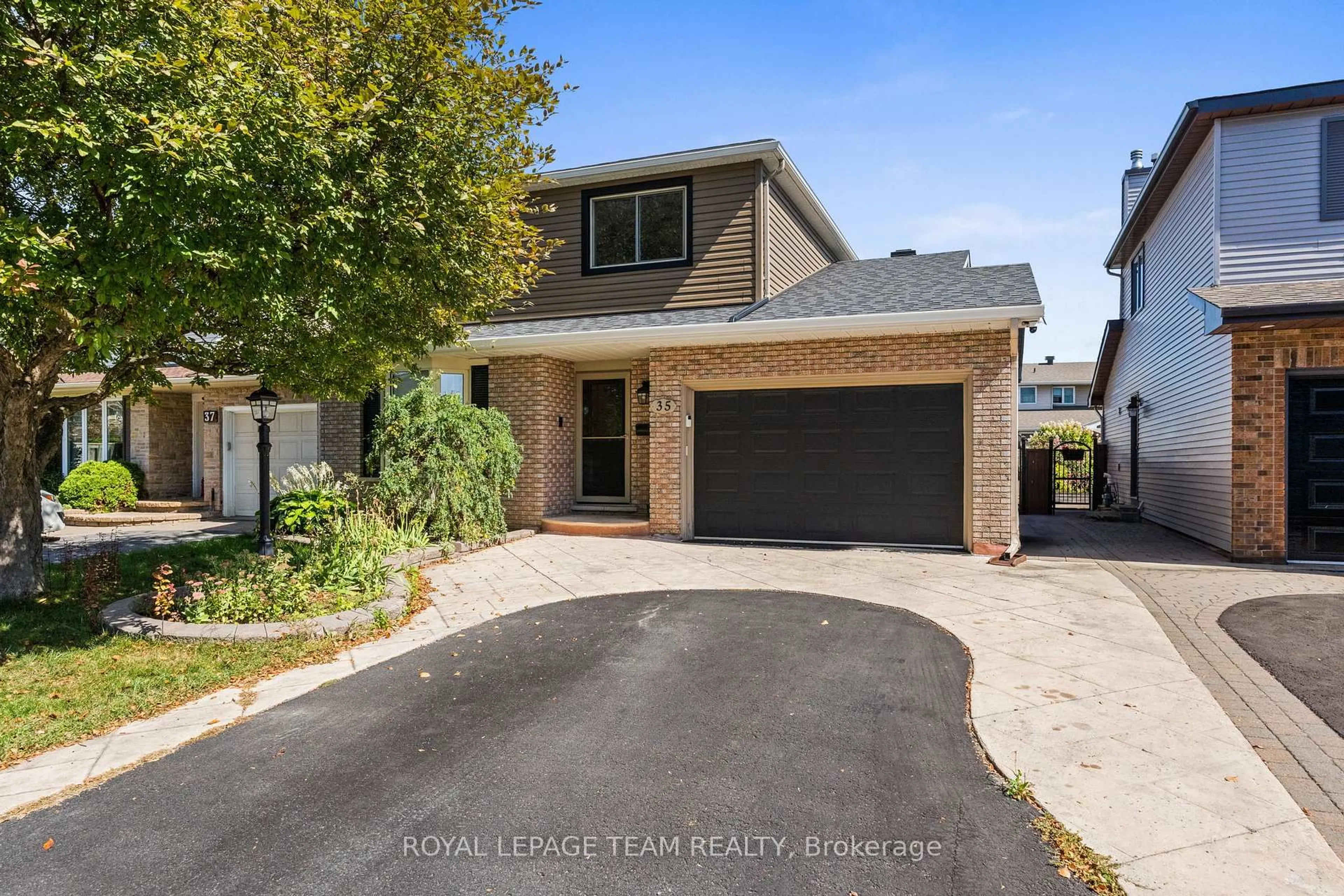 Home with brick exterior material, street for 35 IVYLEA St, Ottawa Ontario K2G 4X1
