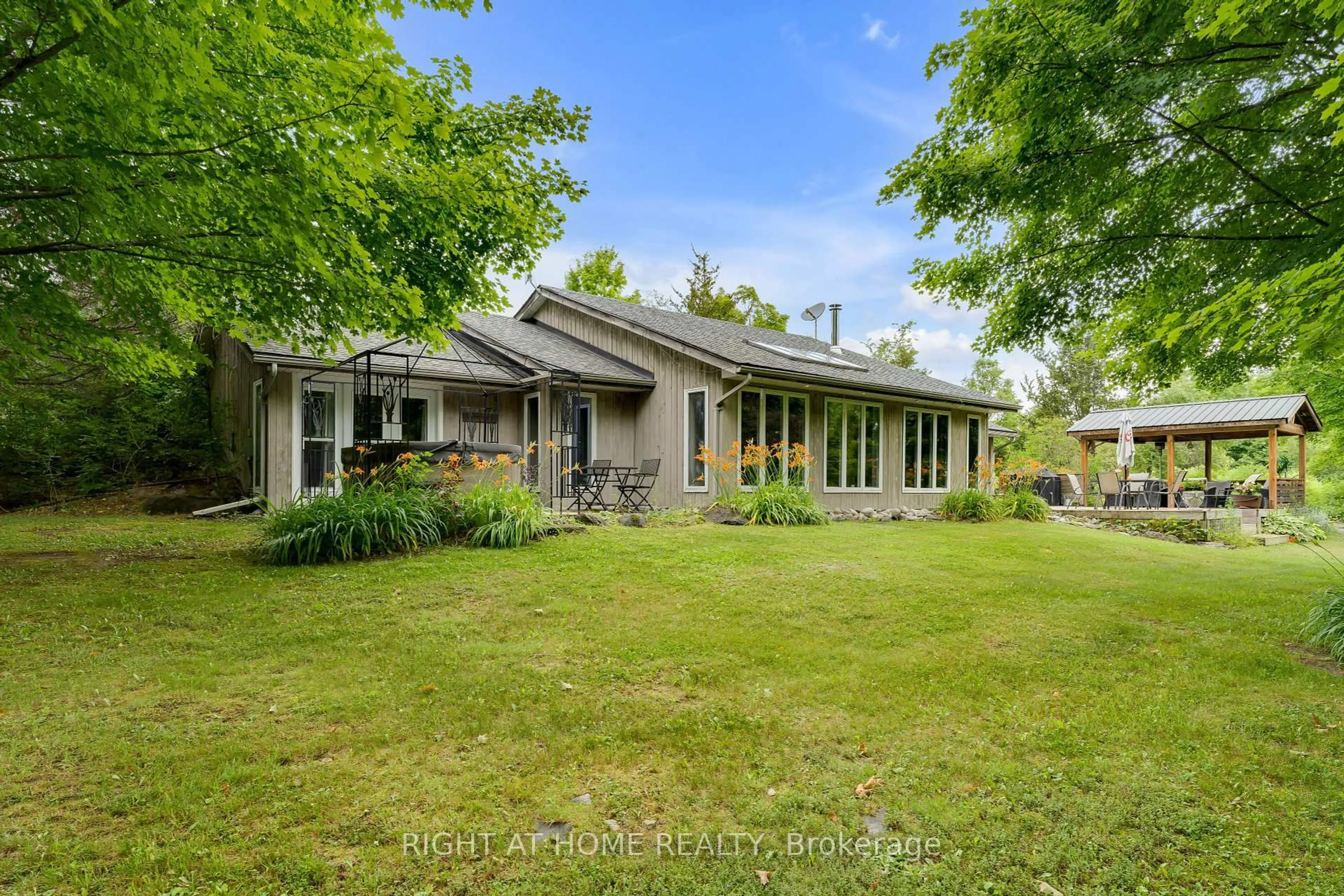A pic from outside/outdoor area/front of a property/back of a property/a pic from drone, unknown for 532 County Road 14 Rd, Stone Mills Ontario K0K 2W0