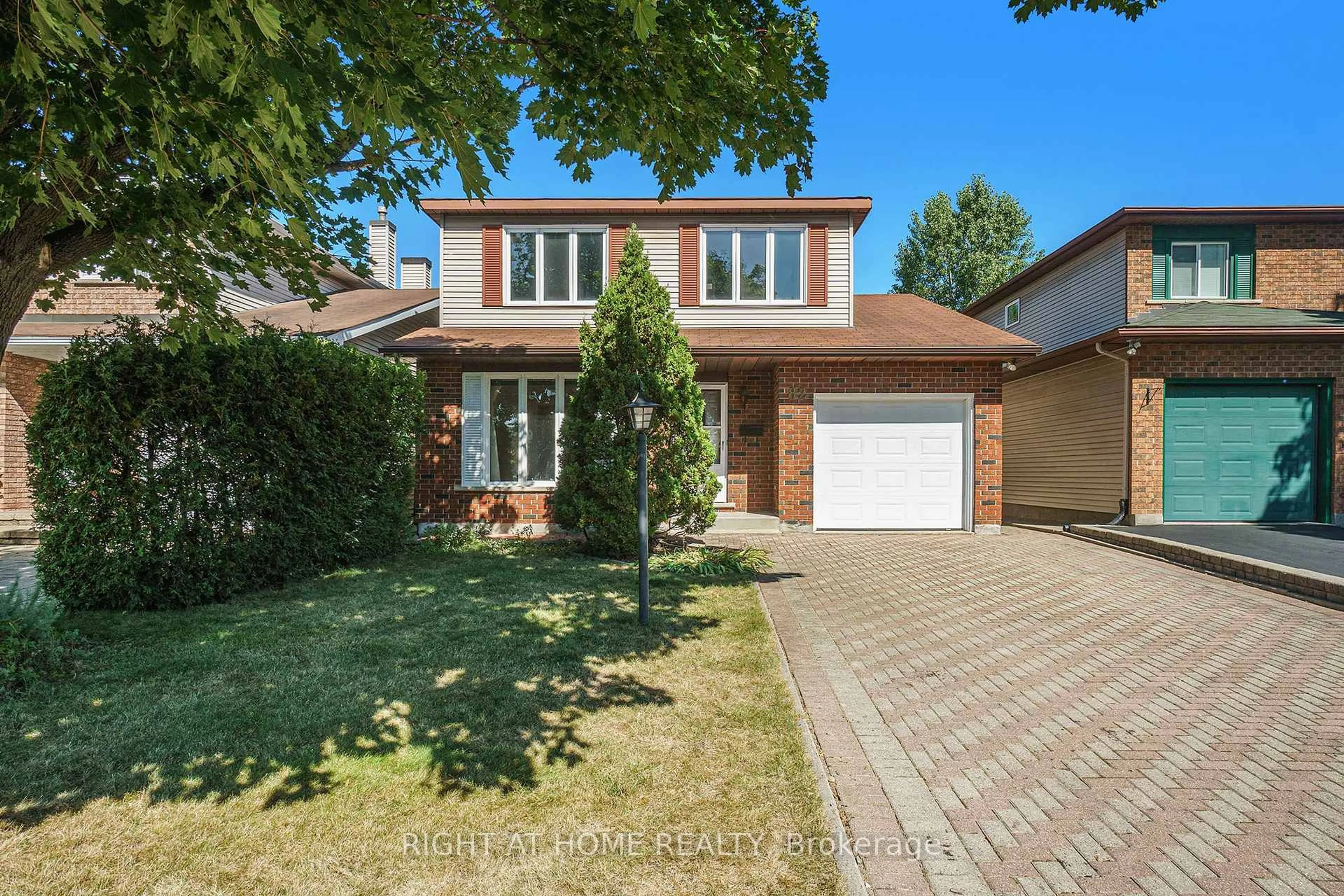 Home with brick exterior material, street for 82 Nestow Dr, Ottawa Ontario K2G 4L8