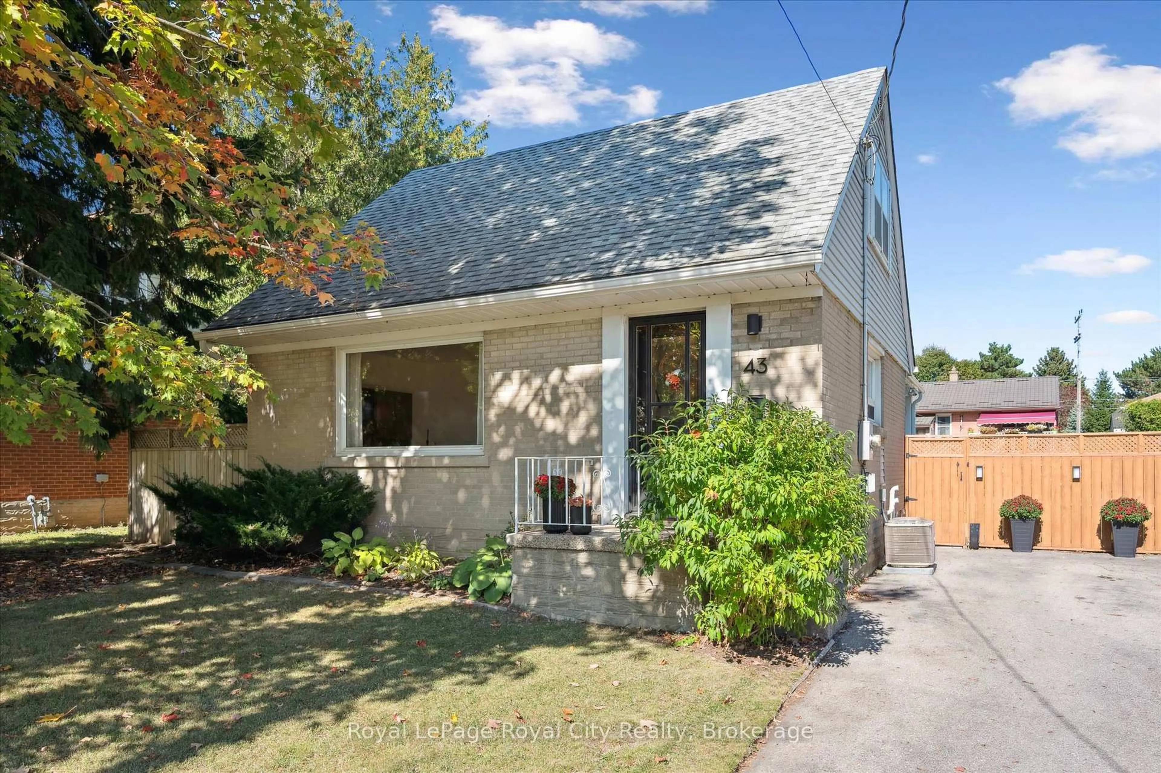 Home with brick exterior material, street for 43 Vancouver Dr, Guelph Ontario N1E 2E7