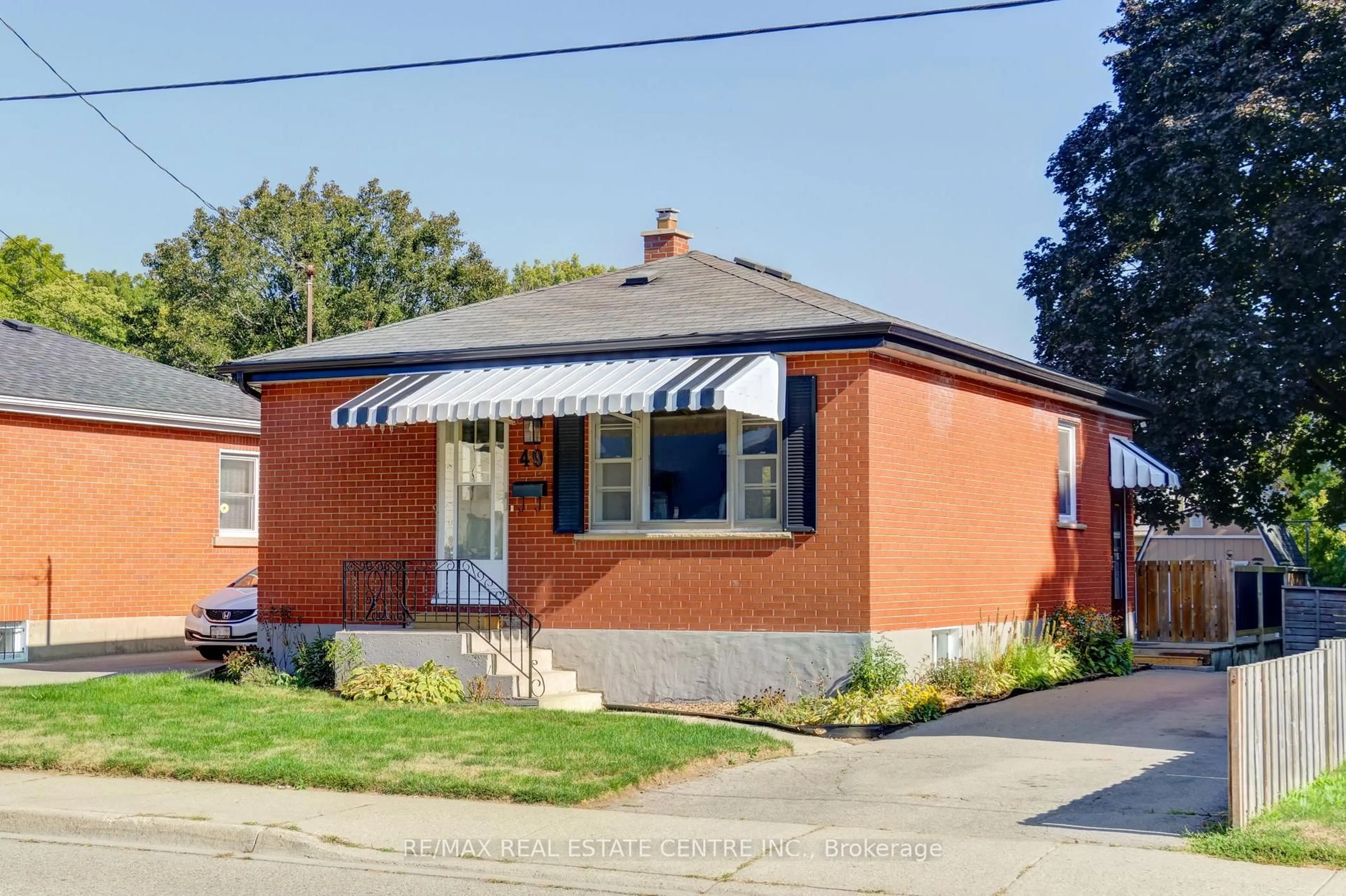 Home with brick exterior material, street for 49 Spring St, Brantford Ontario N3T 4M6