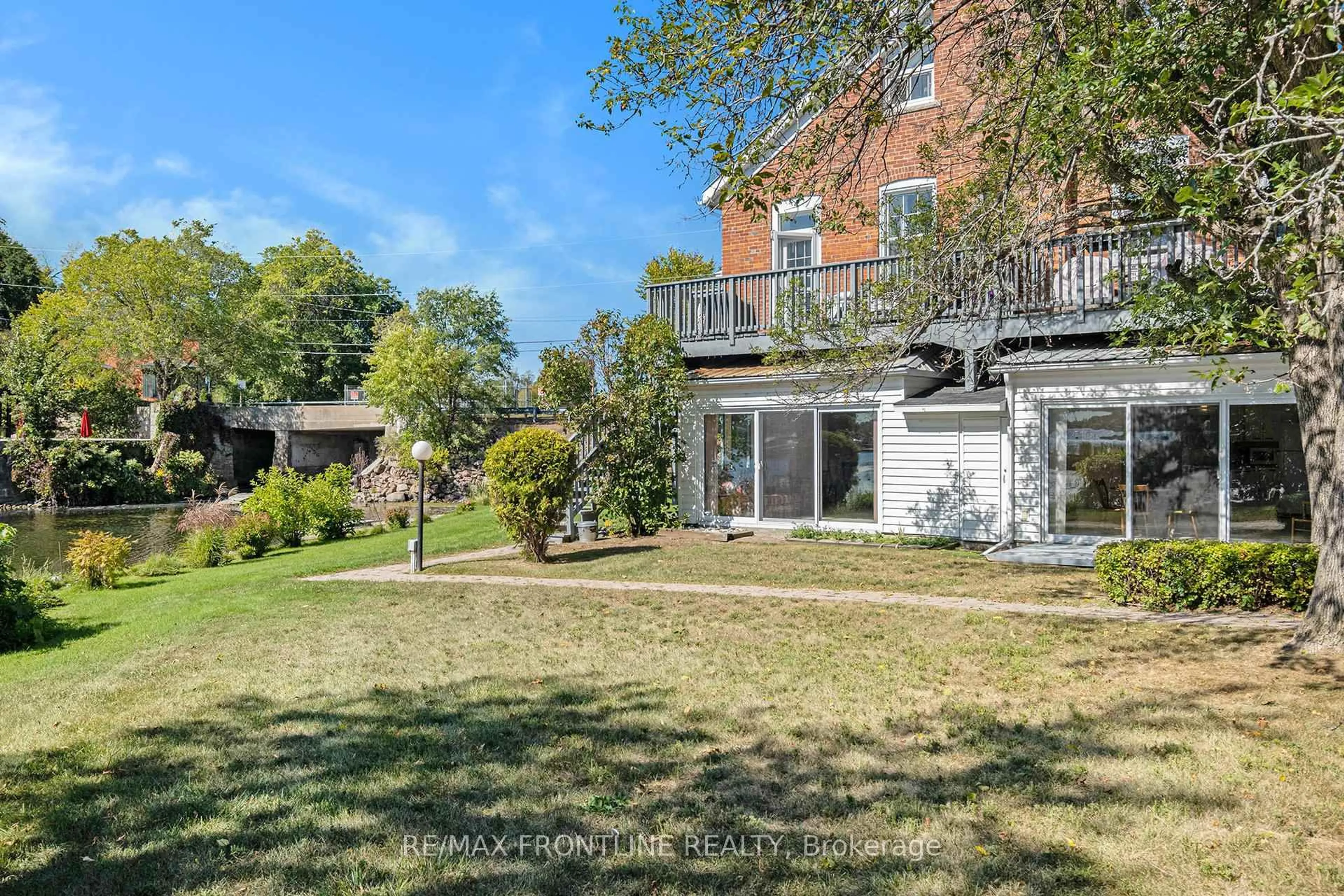 A pic from outside/outdoor area/front of a property/back of a property/a pic from drone, unknown for 19 Main St #1, Westport Ontario K0G 1X0