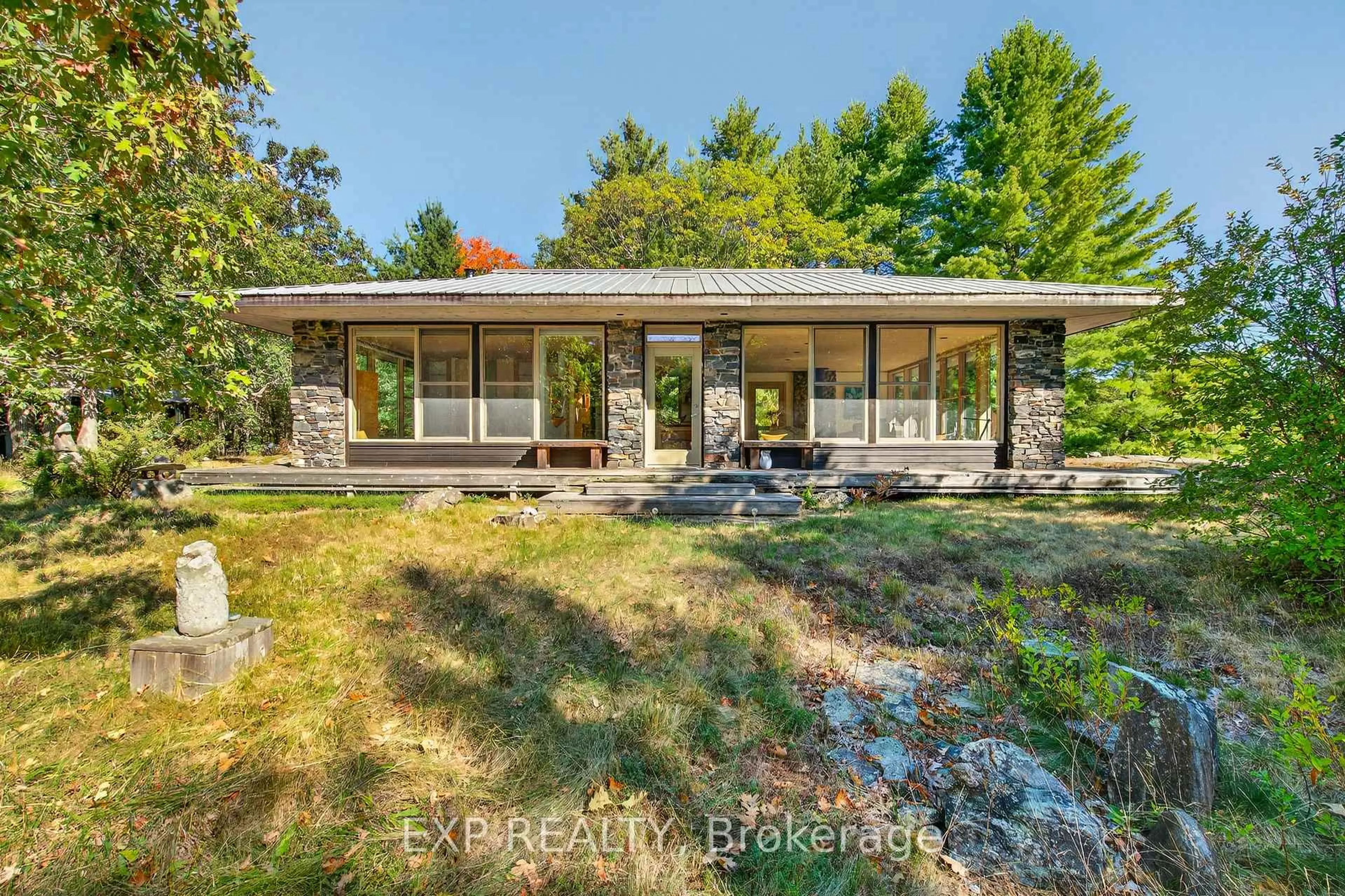 A pic from outside/outdoor area/front of a property/back of a property/a pic from drone, water/lake/river/ocean view for 3532 County Rd 15 Rd, Arden Ontario K0H 1B0