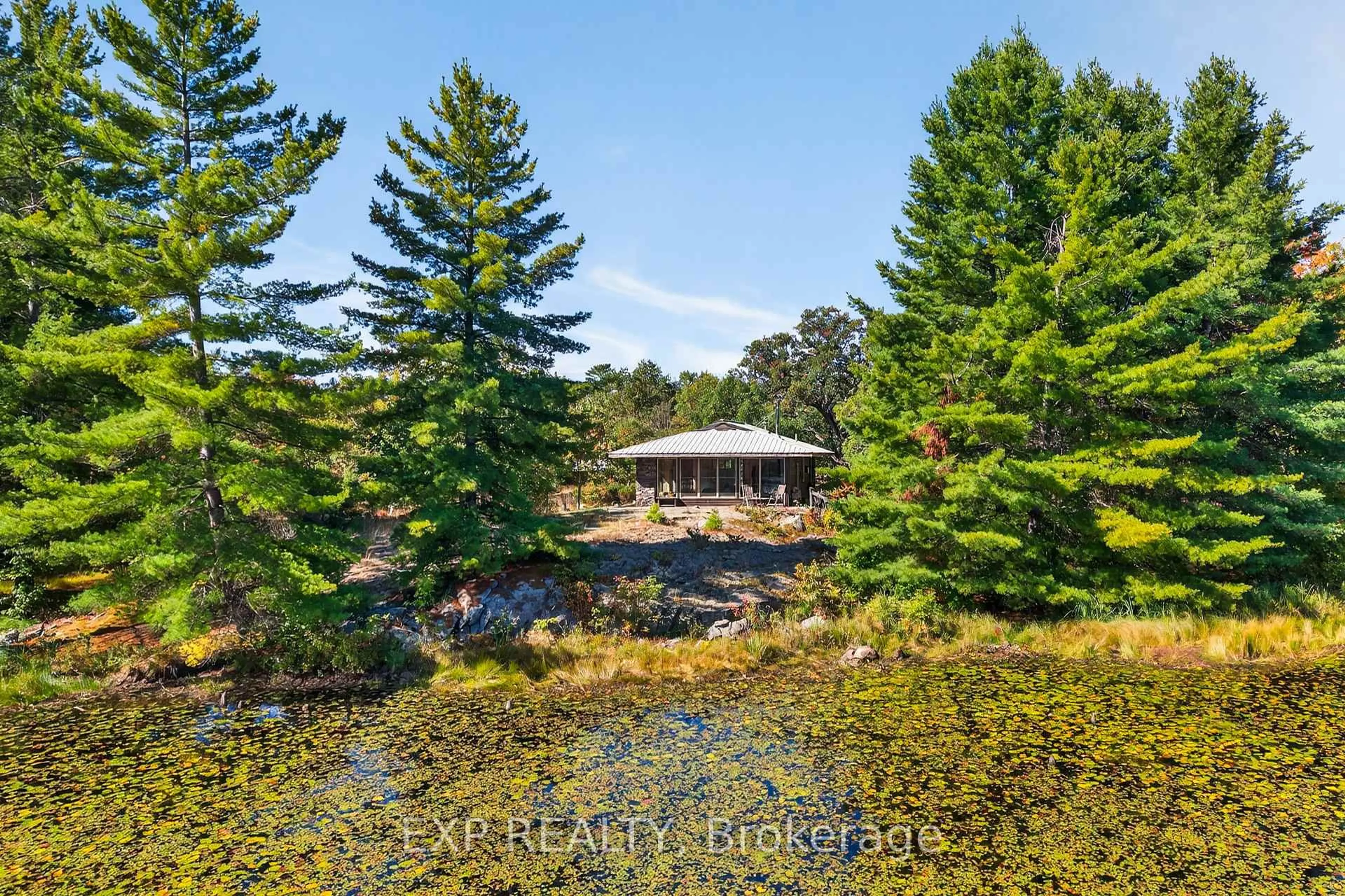 A pic from outside/outdoor area/front of a property/back of a property/a pic from drone, water/lake/river/ocean view for 3532 County Rd 15 Rd, Arden Ontario K0H 1B0